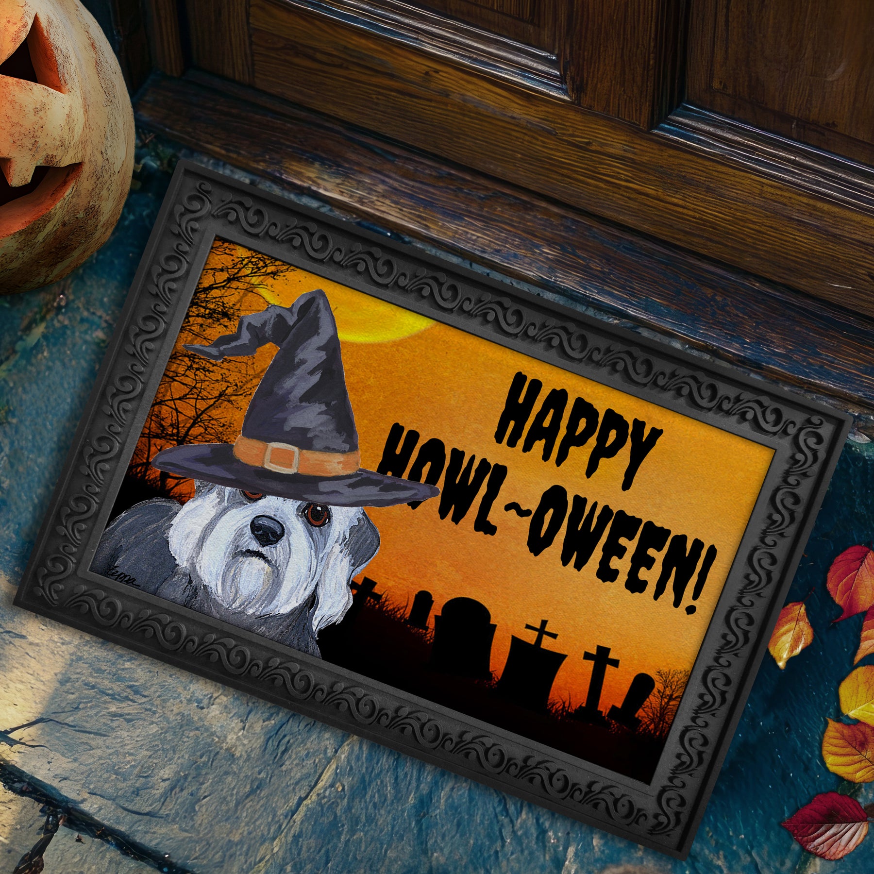 Halloween-themed doormat with a Dandi Dinmont Terrier wearing a witch hat and 'Happy Howl-Oween!' text on a doorstep.
