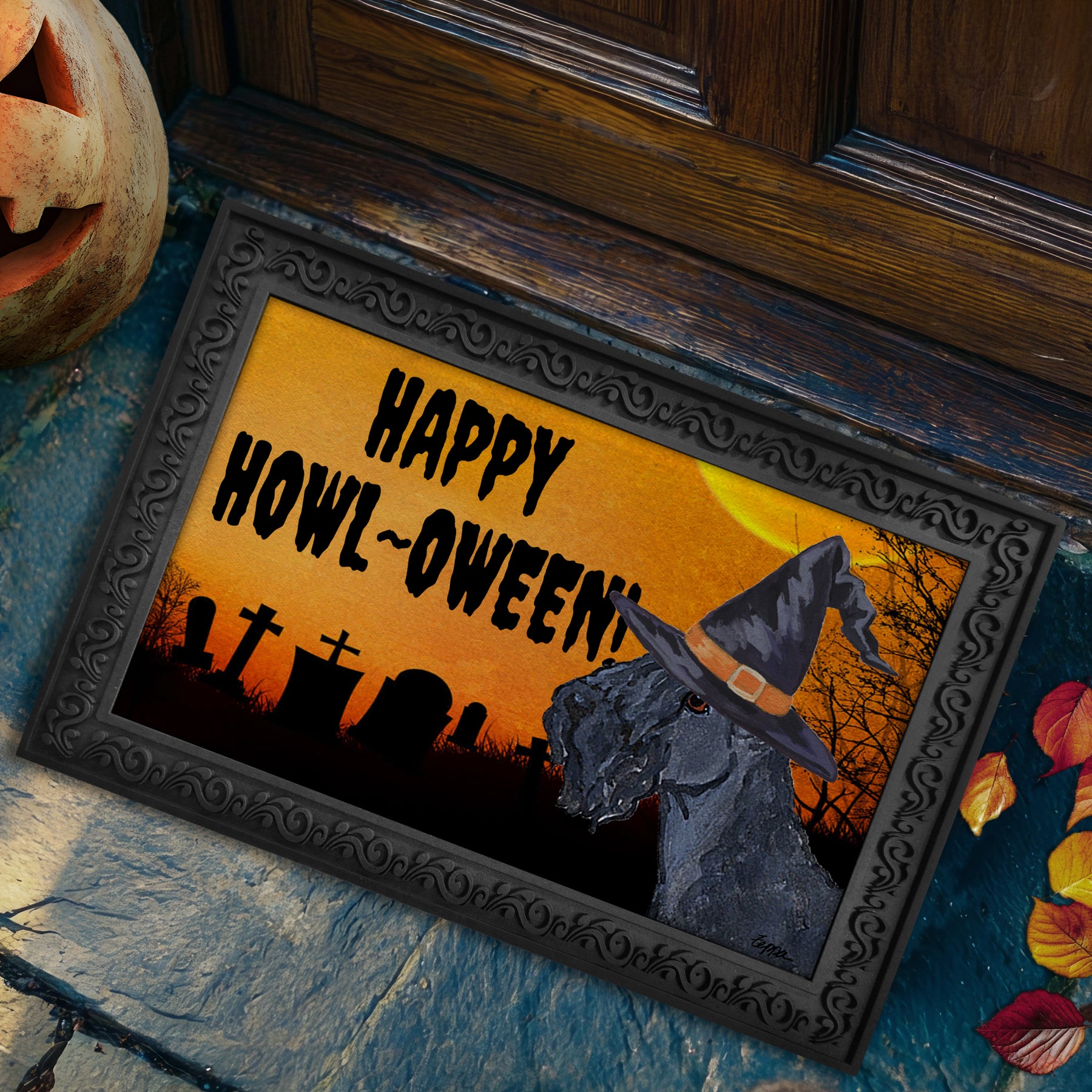 Halloween-themed doormat with a Kerry Blue Terrier wearing a witch hat and 'Happy Howl-Oween!' text, placed on a stone surface.