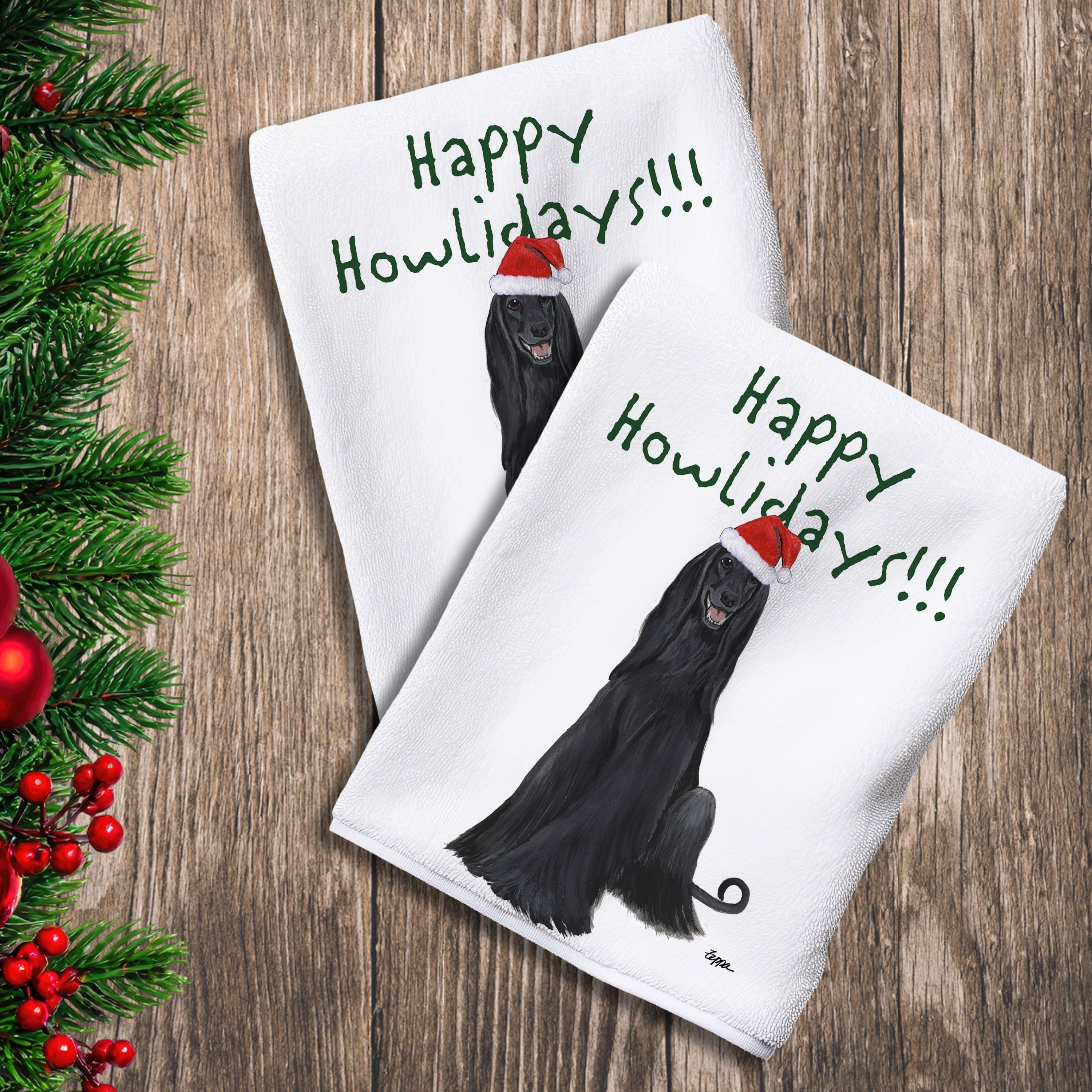 2 Kitchen Towels with a black Afghan Hound in a Santa Hat and Happy Howlidays text.
