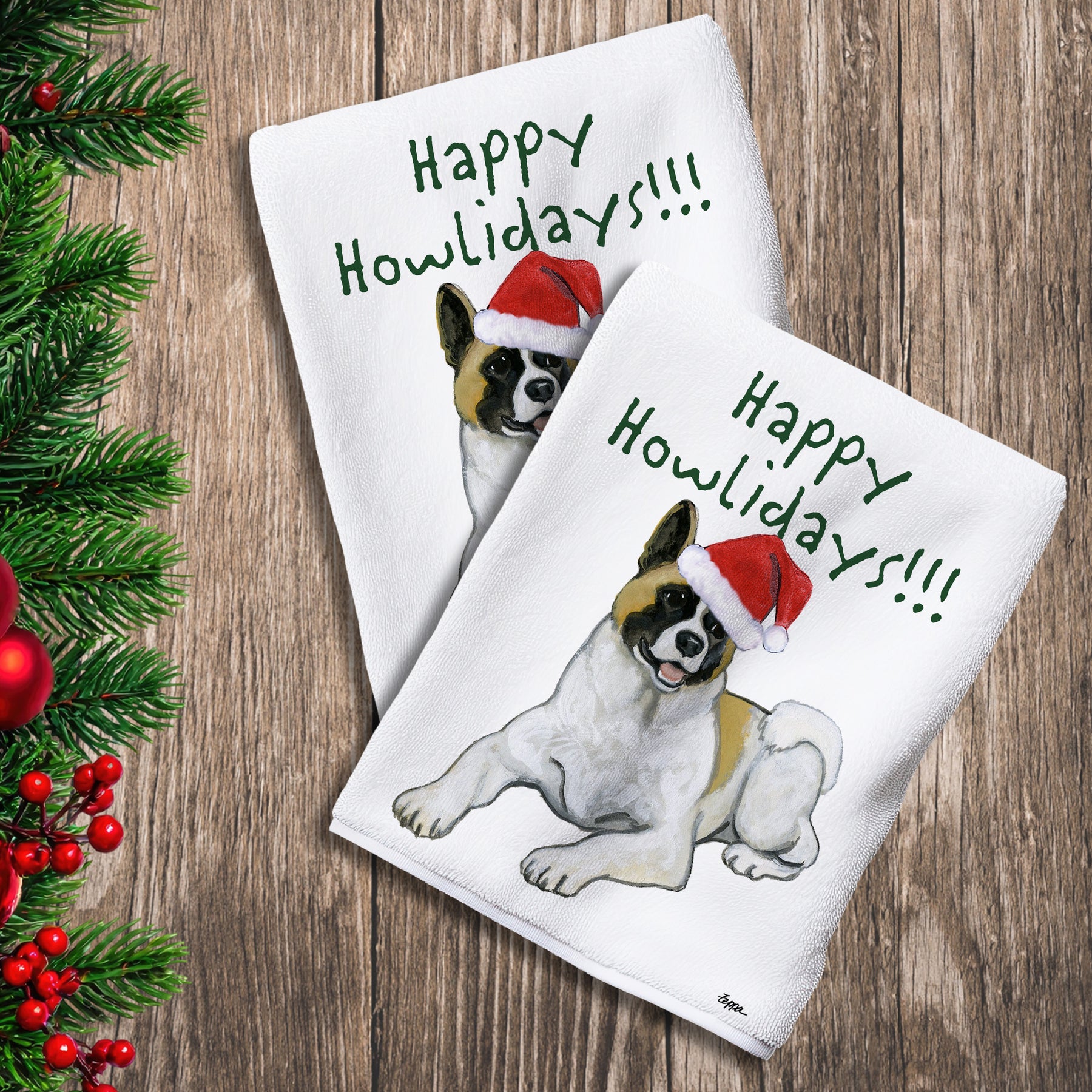 2 Kitchen Towels with an Akita in a Santa Hat and Happy Howlidays text.