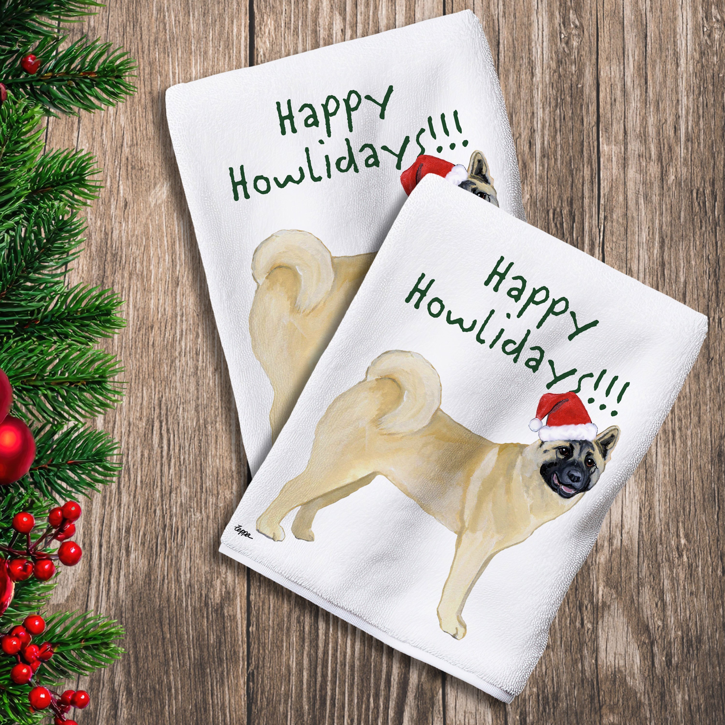 2 Kitchen Towels with an Akita in a Santa Hat and Happy Howlidays text.