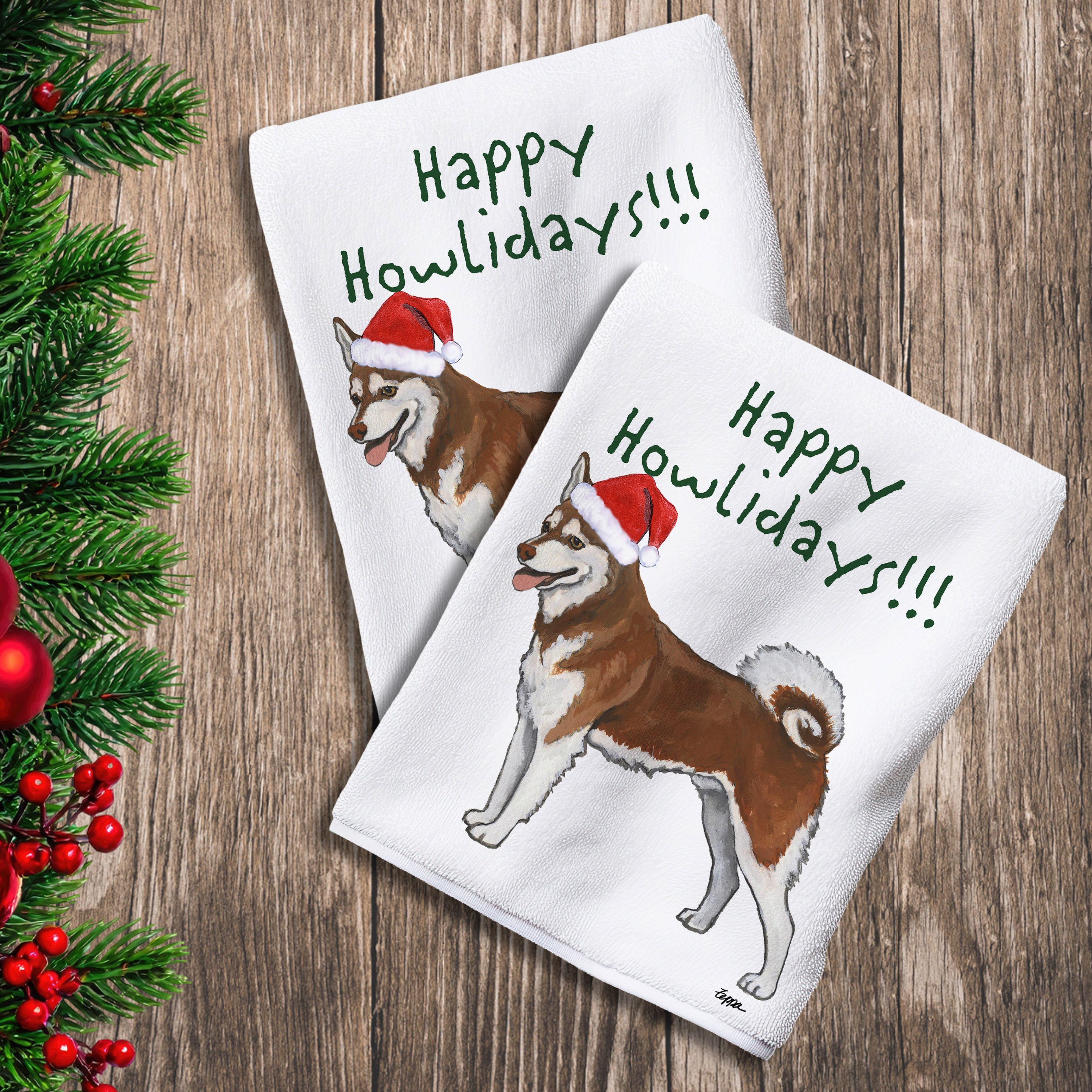 2 Kitchen Towels with an Alaskan Klee Kai in a Santa Hat and Happy Howlidays text.