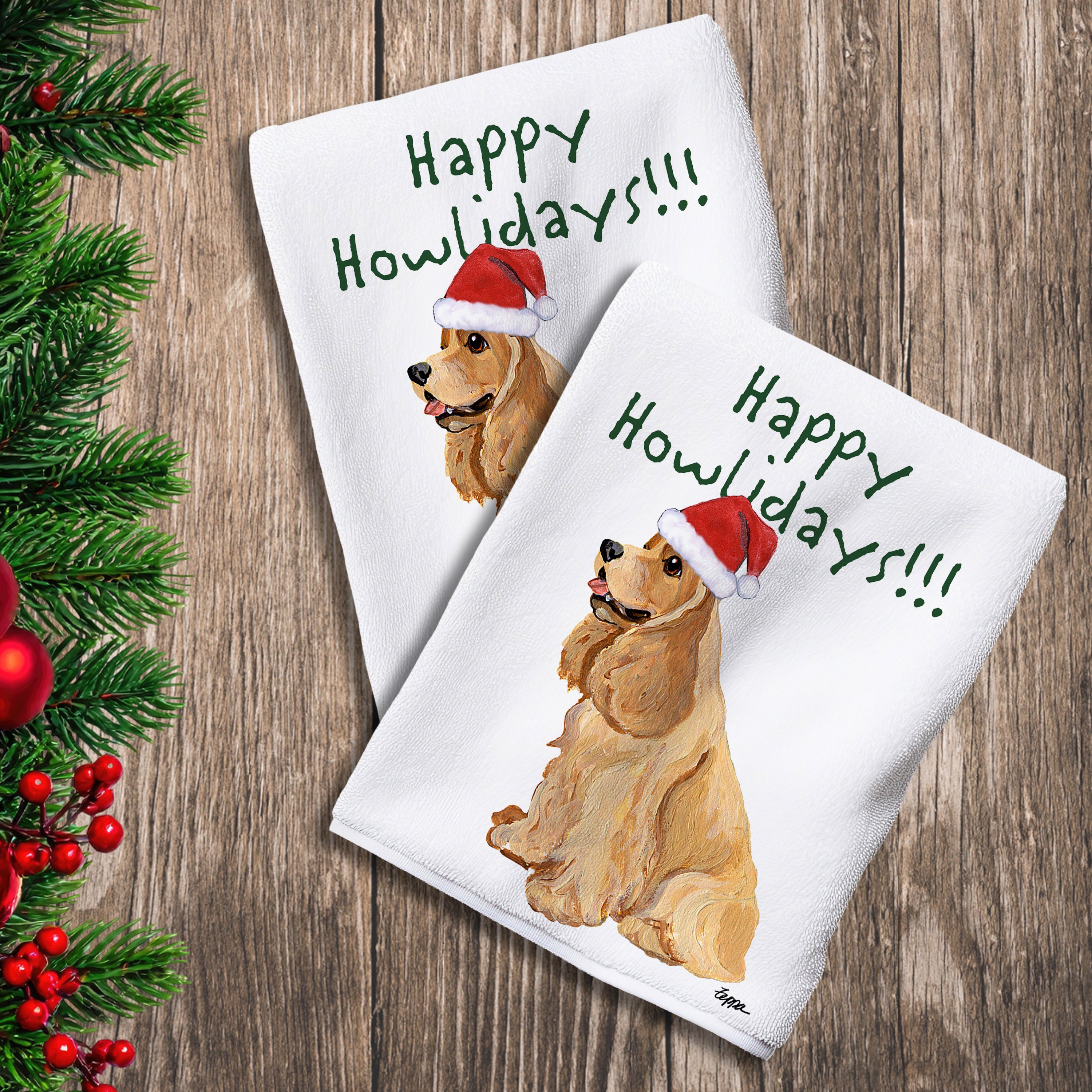 2 Kitchen Towels with a blonde American Cocker Spaniel in a Santa Hat and Happy Howlidays text.