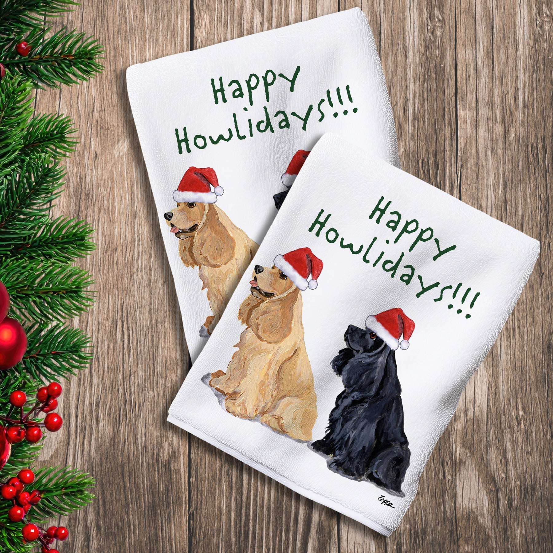 2 Kitchen Towels with an American Cocker Spaniel pair in a Santa Hat and Happy Howlidays text.