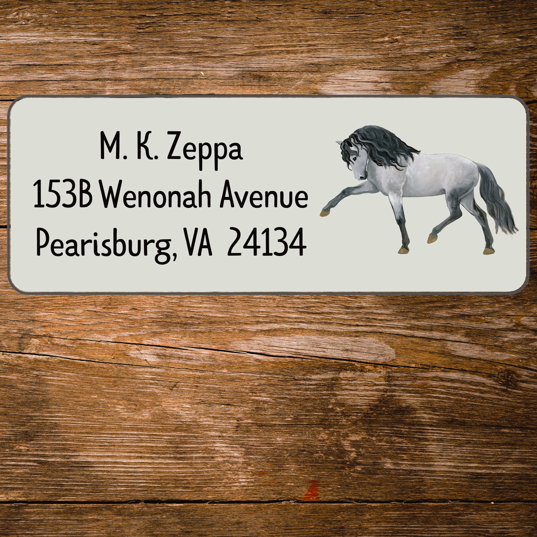 Return address label with an illustration of an Andalusian Horse.