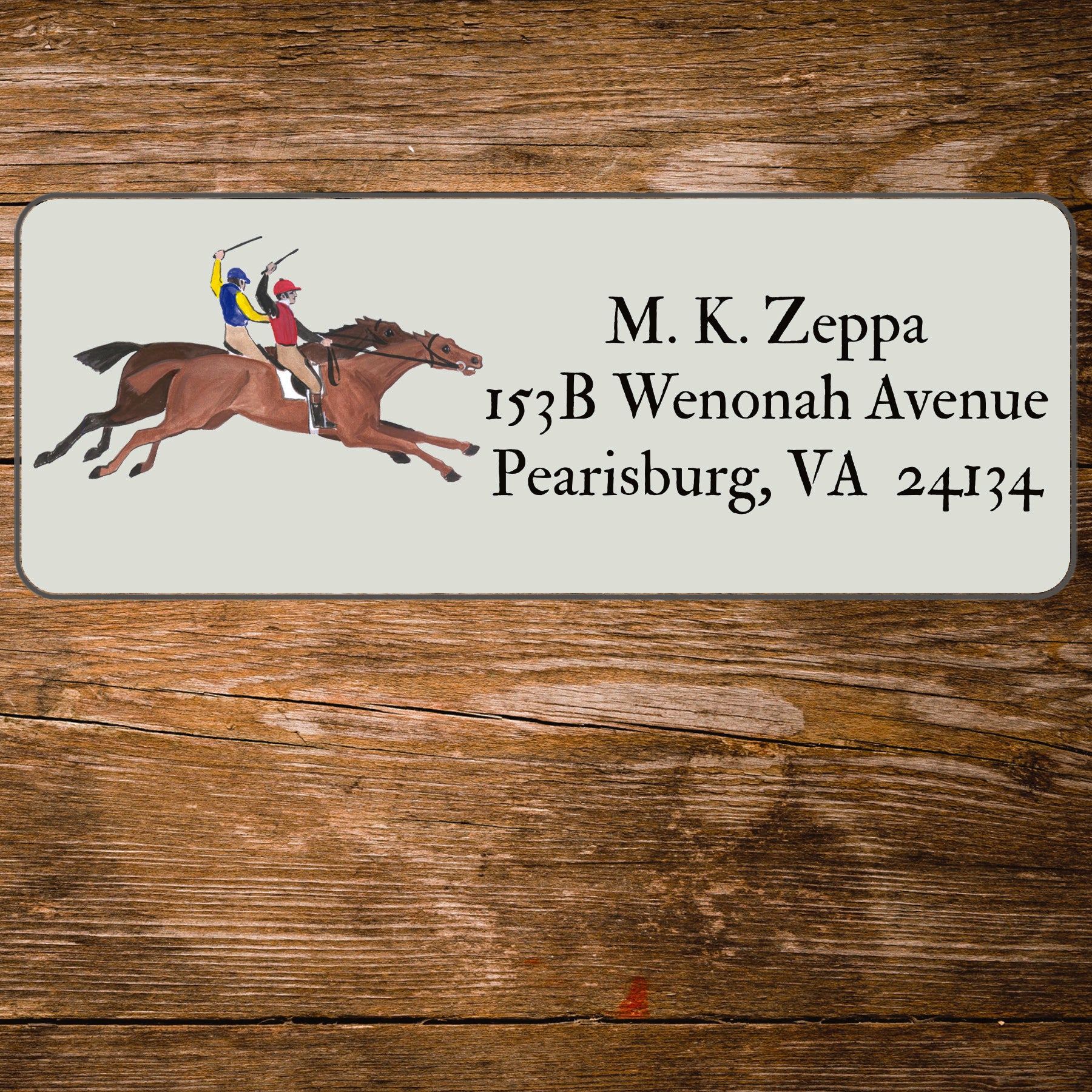 Address label with an antique horse race illustration on a wooden background
