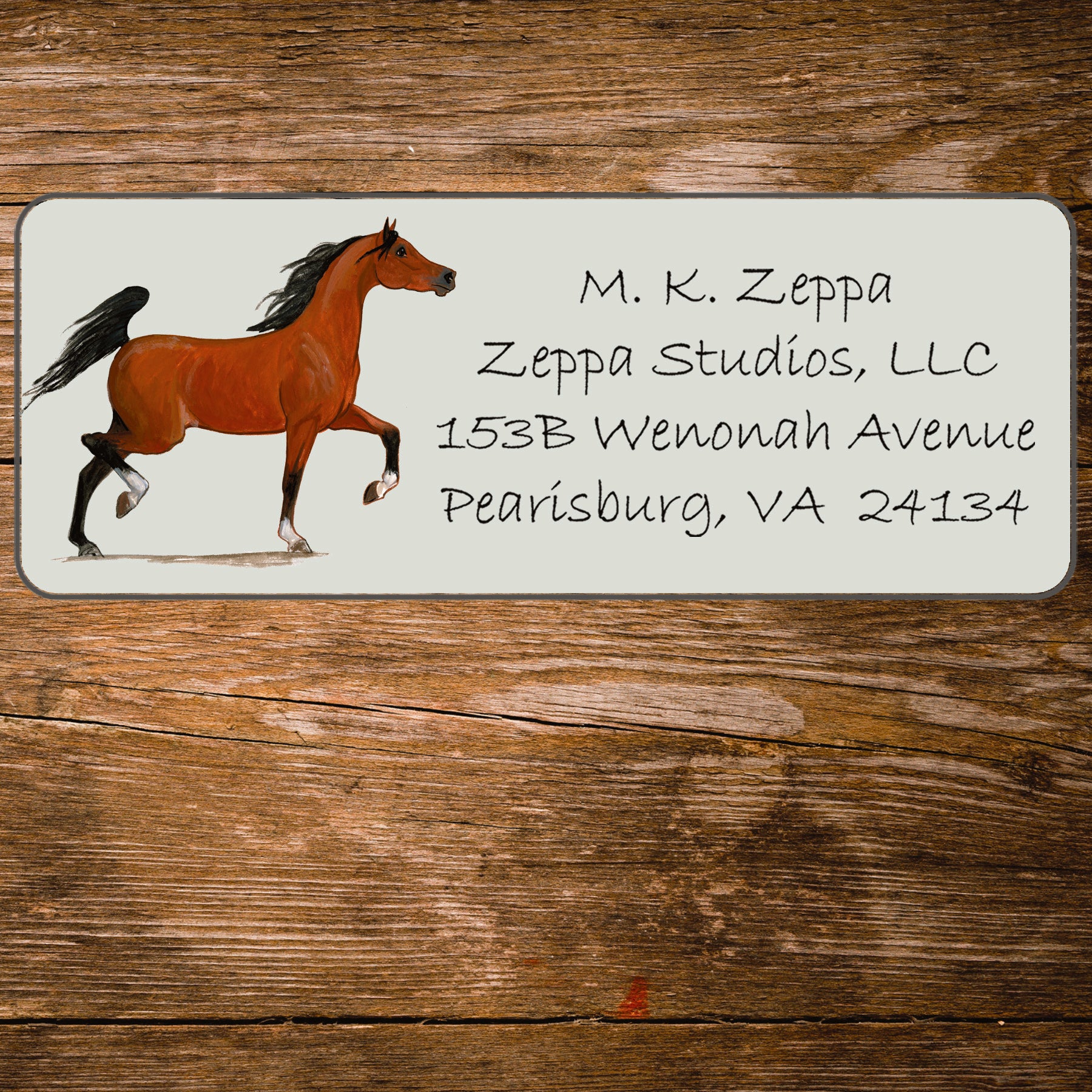 Address label with an Arabian Horse illustration on a wooden background