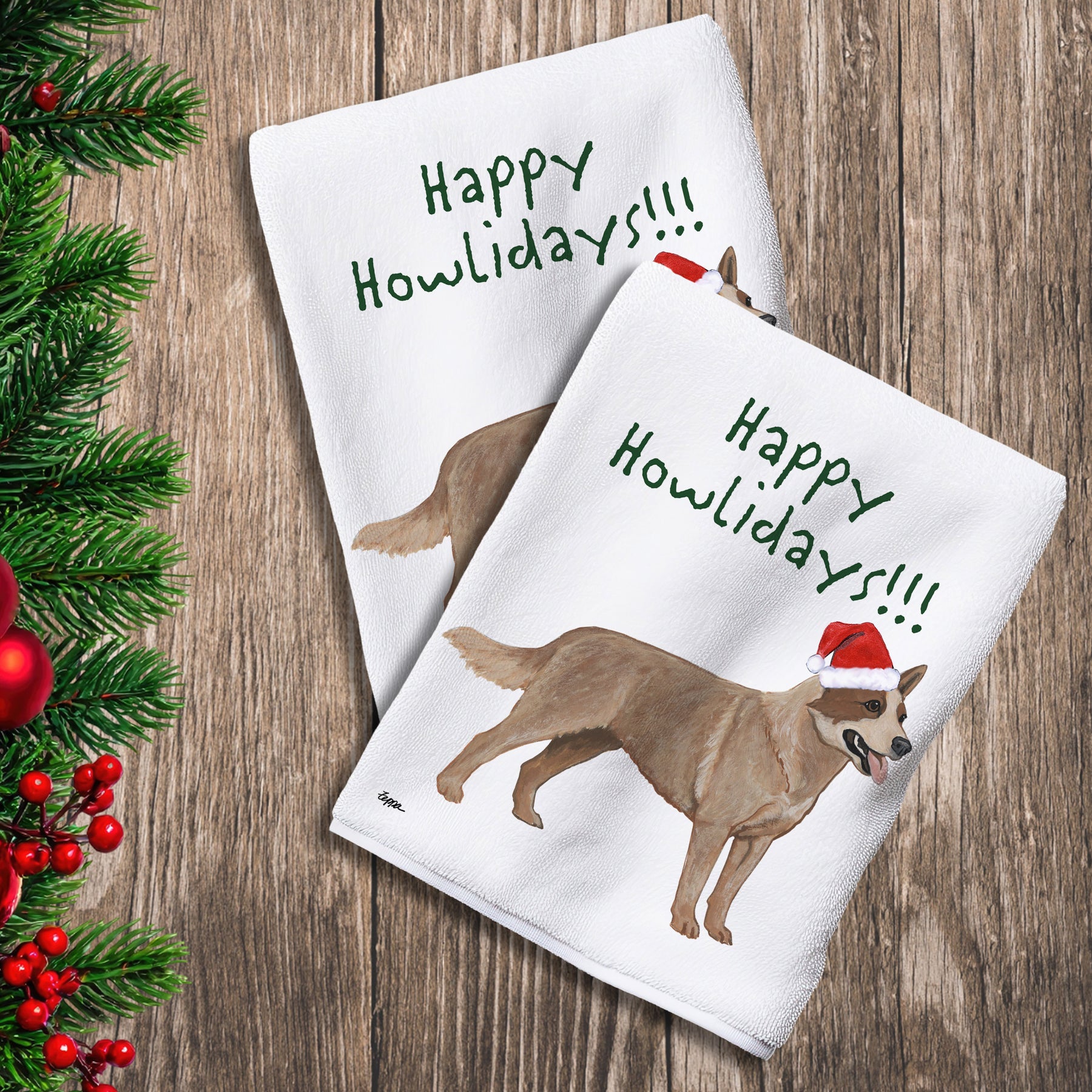 2 Kitchen Towels with a red merle Australian Cattle Dog in a Santa Hat and Happy Howlidays text.