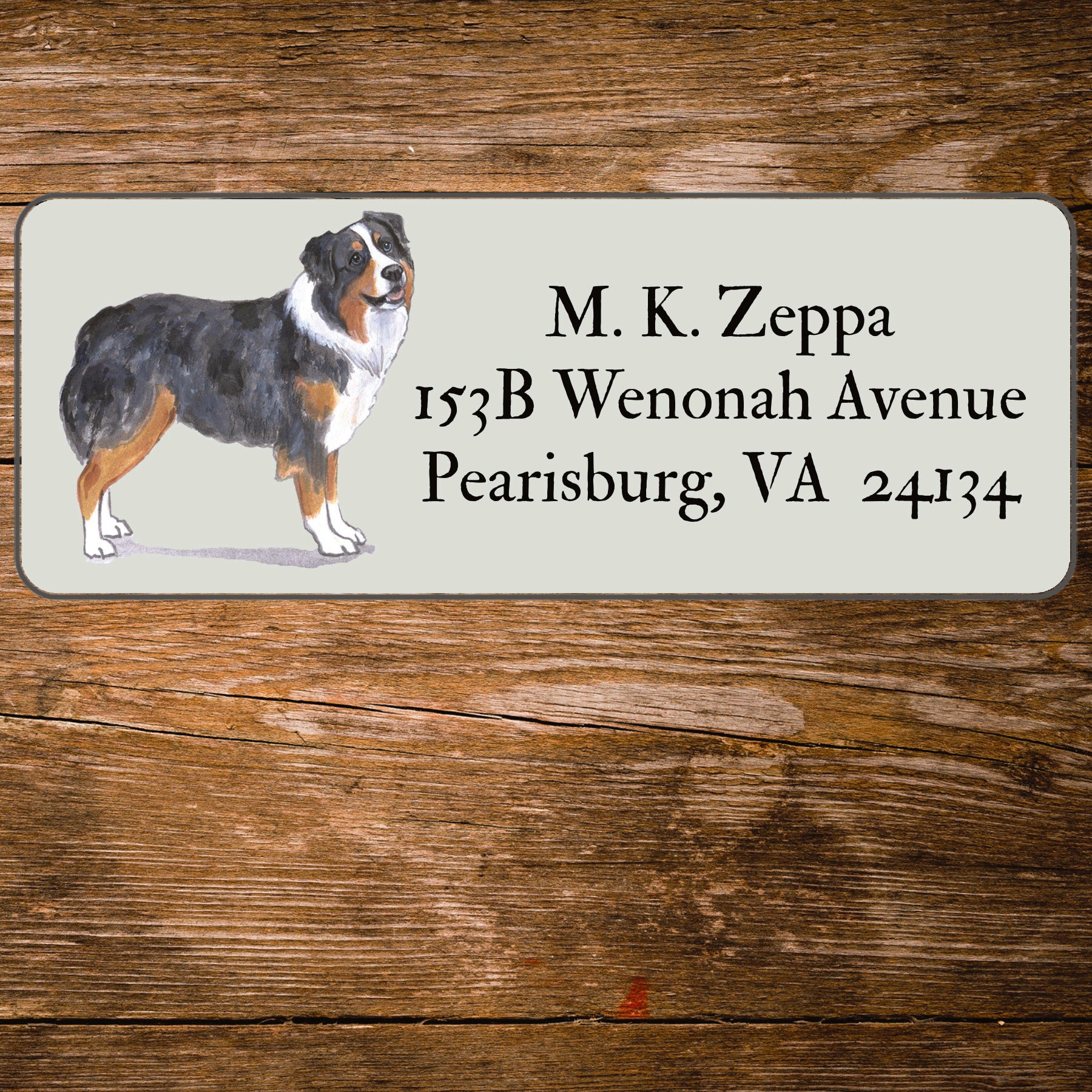 Address label with an Australian Shepherd Dog illustration on a wooden background