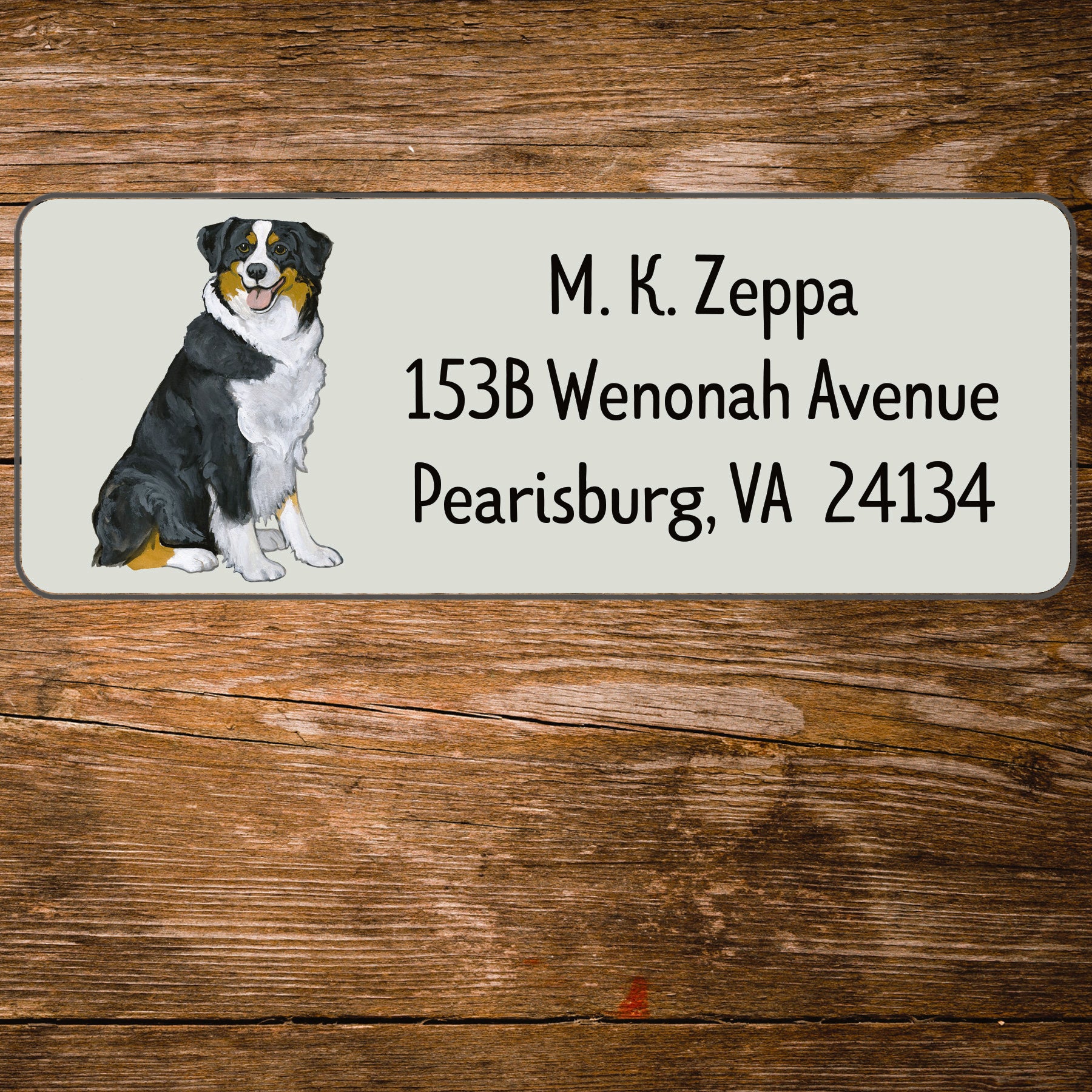 Address label with an Australian Shepherd Dog illustration on a wooden background