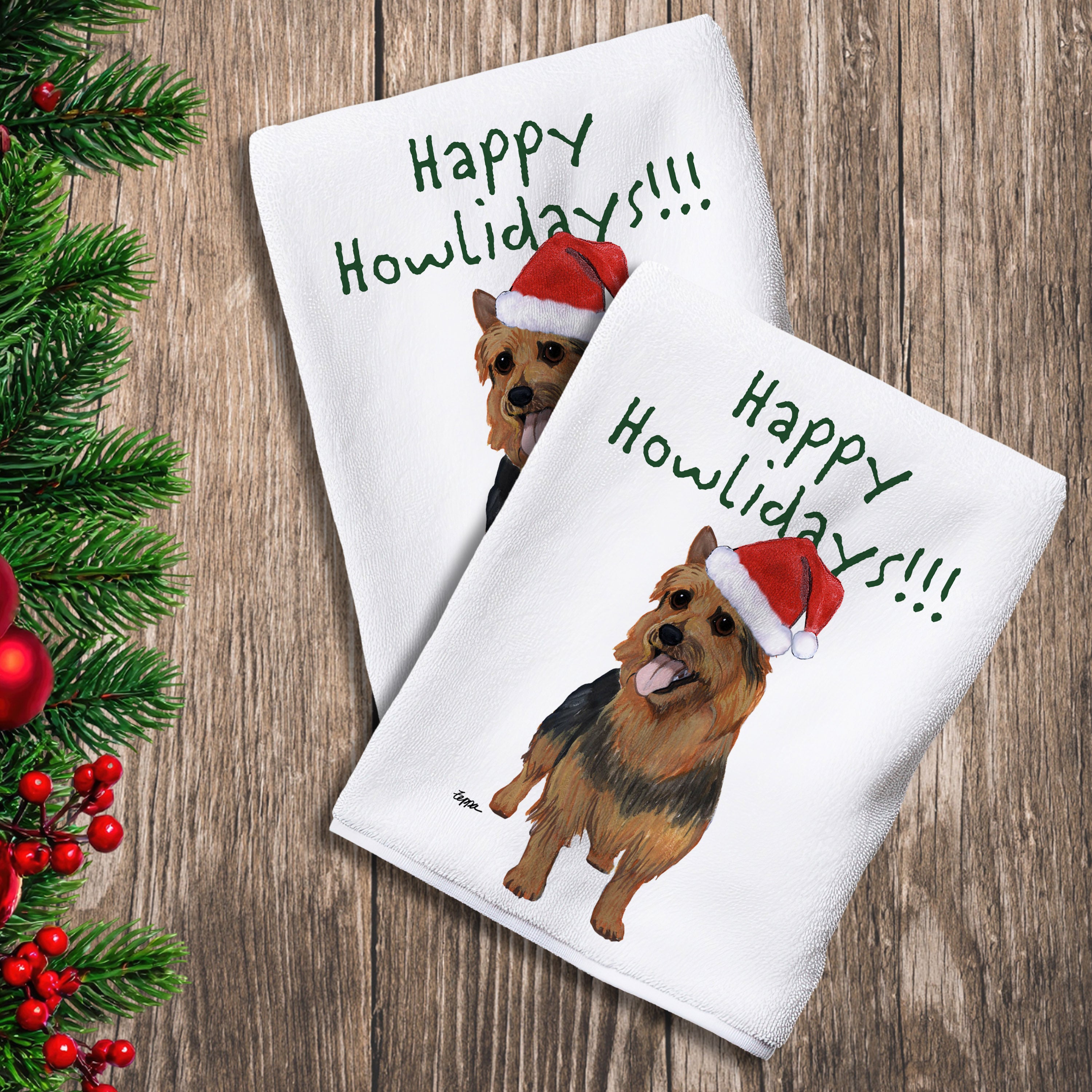 2 Kitchen Towels with an Australian Terrier in a Santa Hat and Happy Howlidays text.