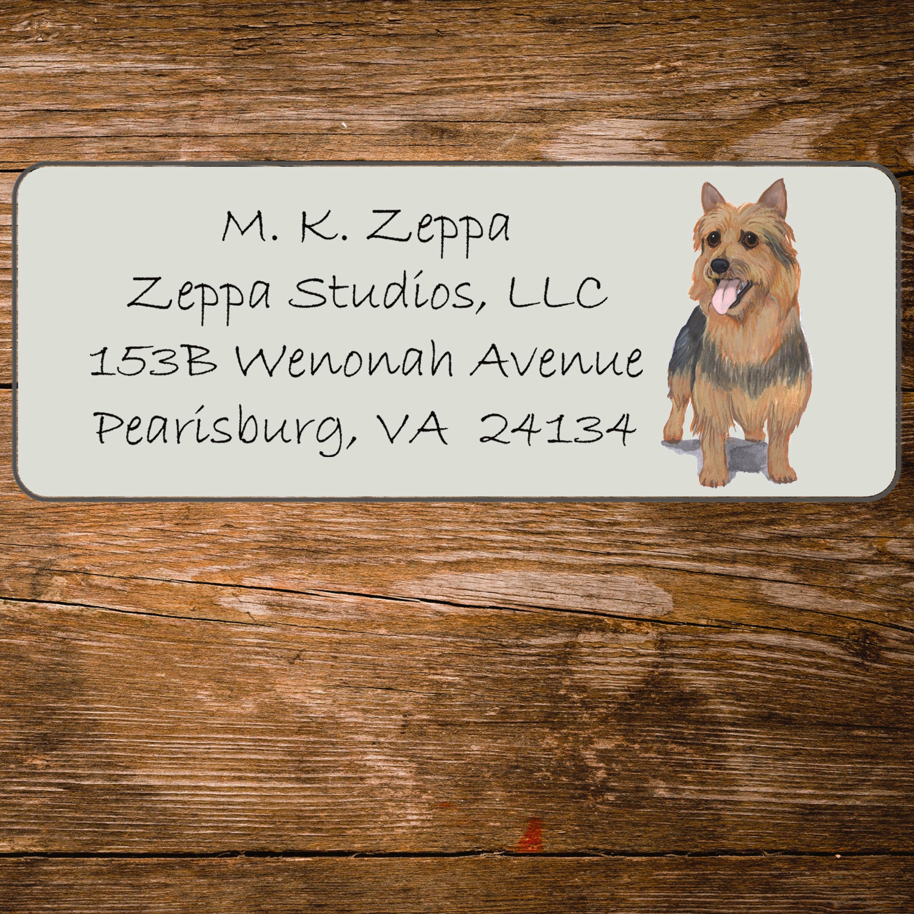 Address label with an Australian Terrier illustration on a wooden background