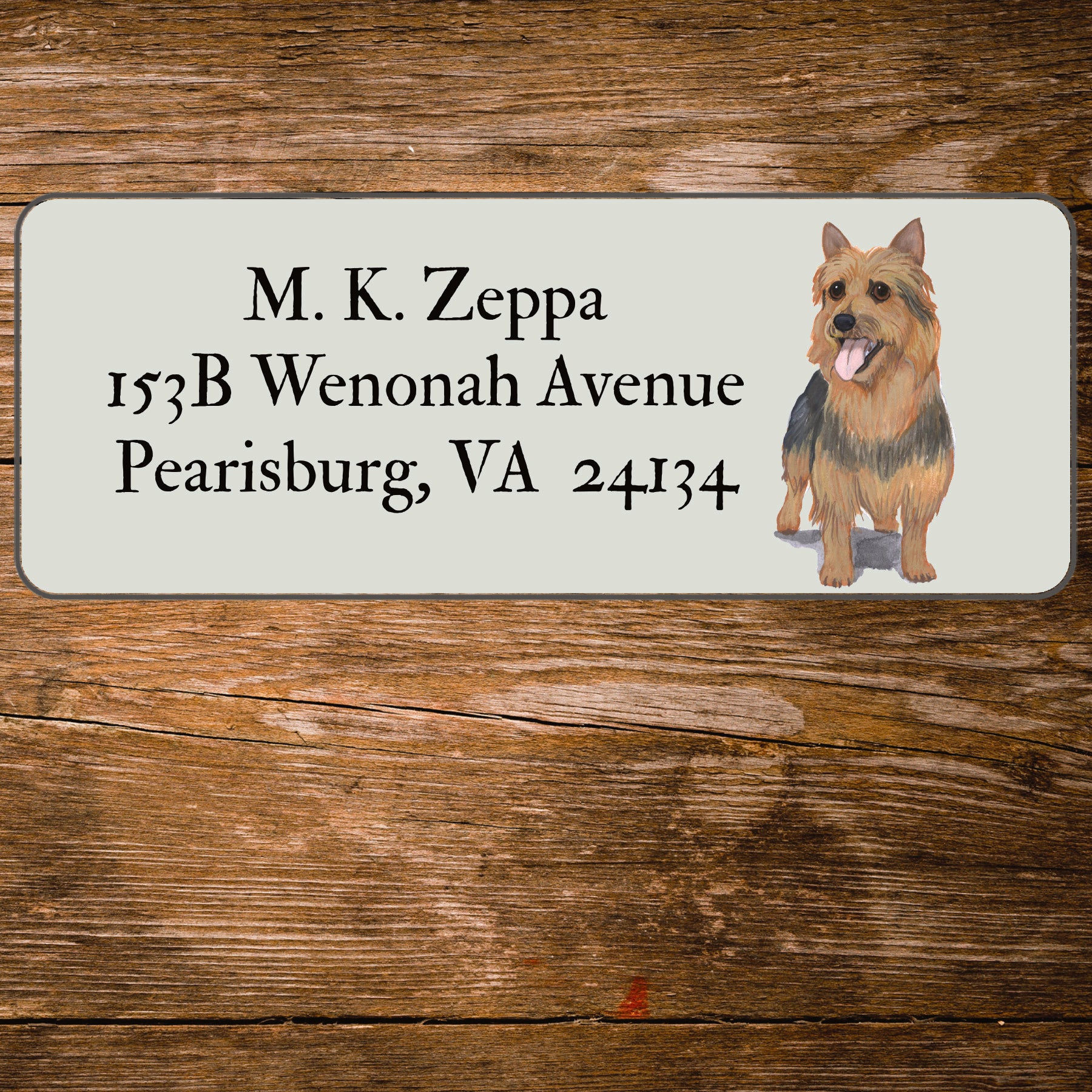 Address label with an Australian Terrier illustration on a wooden background