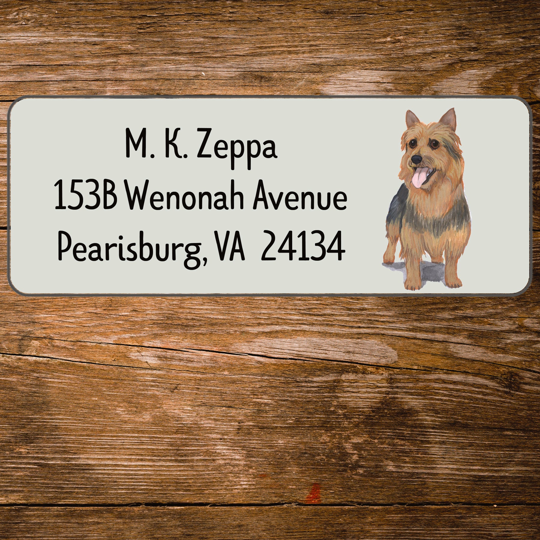 Address label with an Australian Terrier illustration on a wooden background