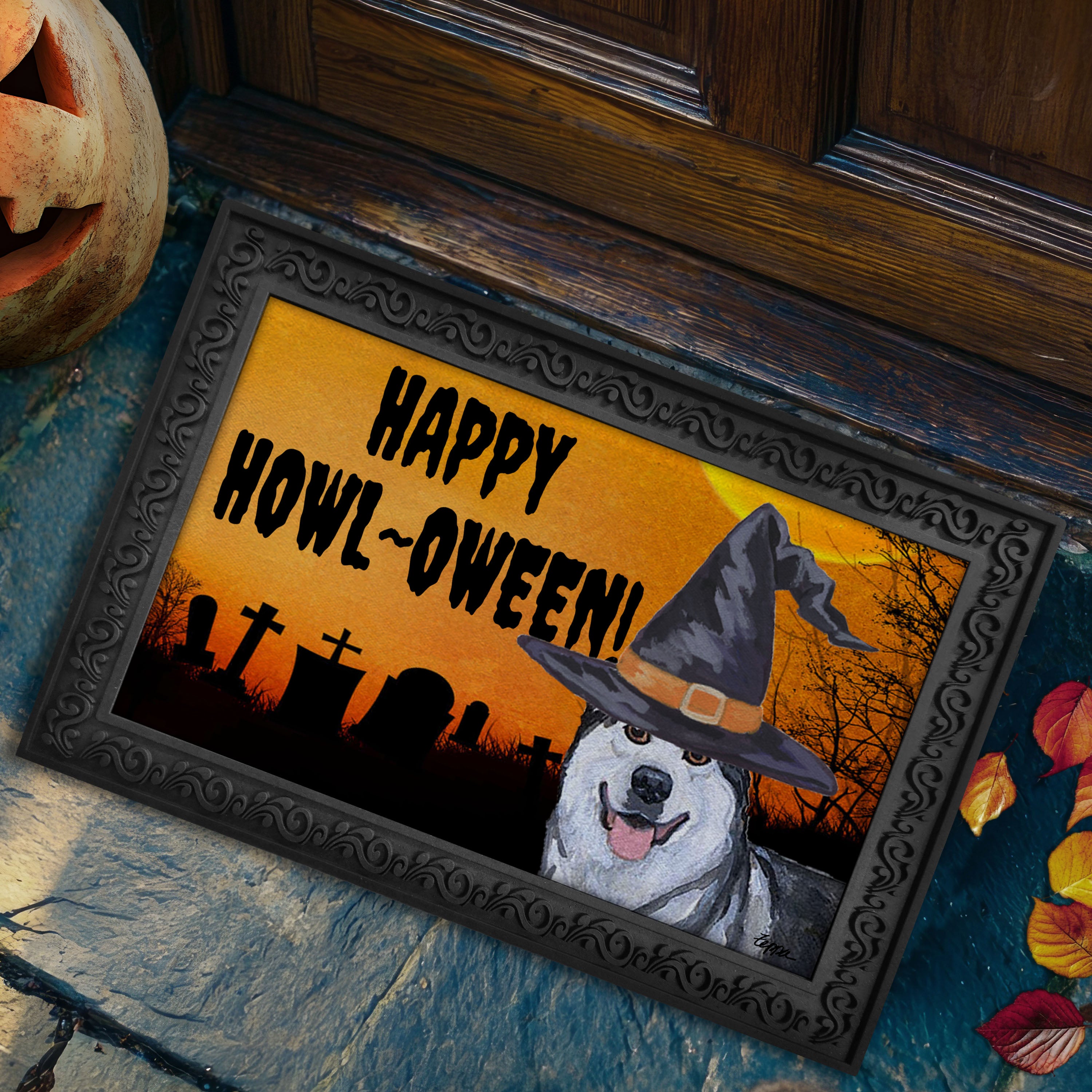 Halloween-themed doormat with a Alaskan Malamute wearing a witch hat and 'Happy Howl-Oween!' text on a doorstep.