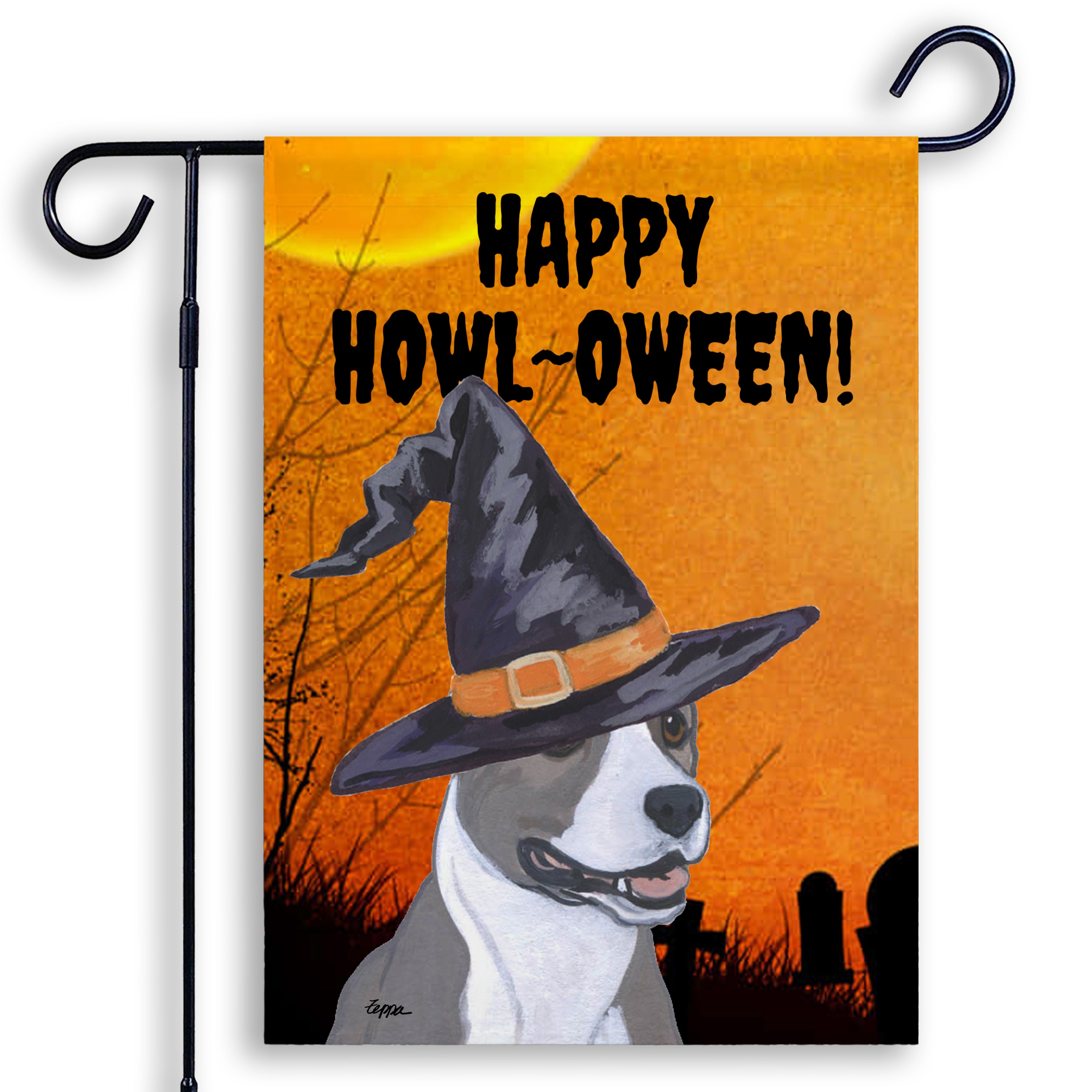 Halloween-themed garden flag with an American Staffordshire Terrier wearing a witch hat and 'Happy Howl-Oween!' text on an orange background.