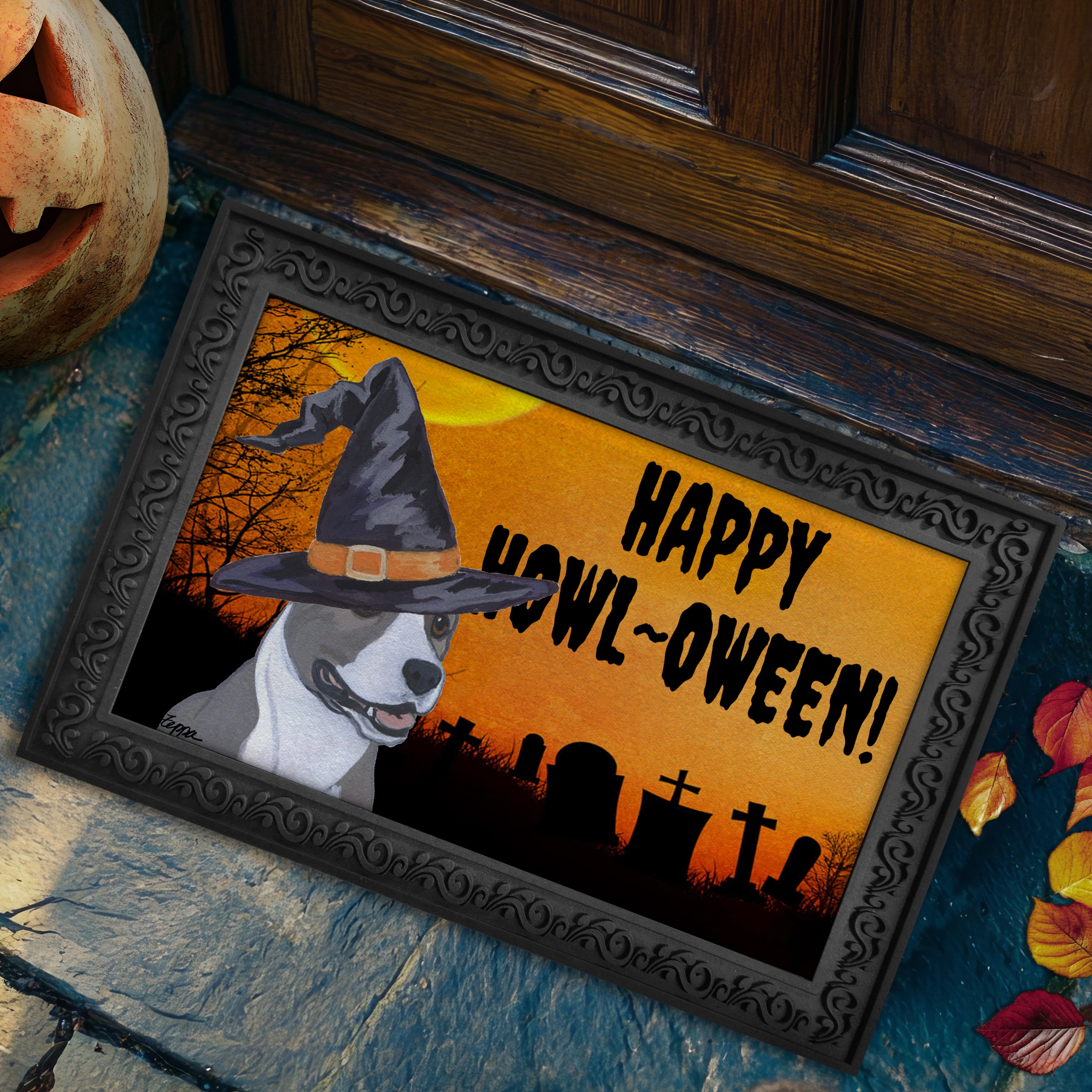 Halloween-themed doormat with a American Staffordshire Terrier wearing a witch hat and 'Happy Howl-Oween!' text on a doorstep.