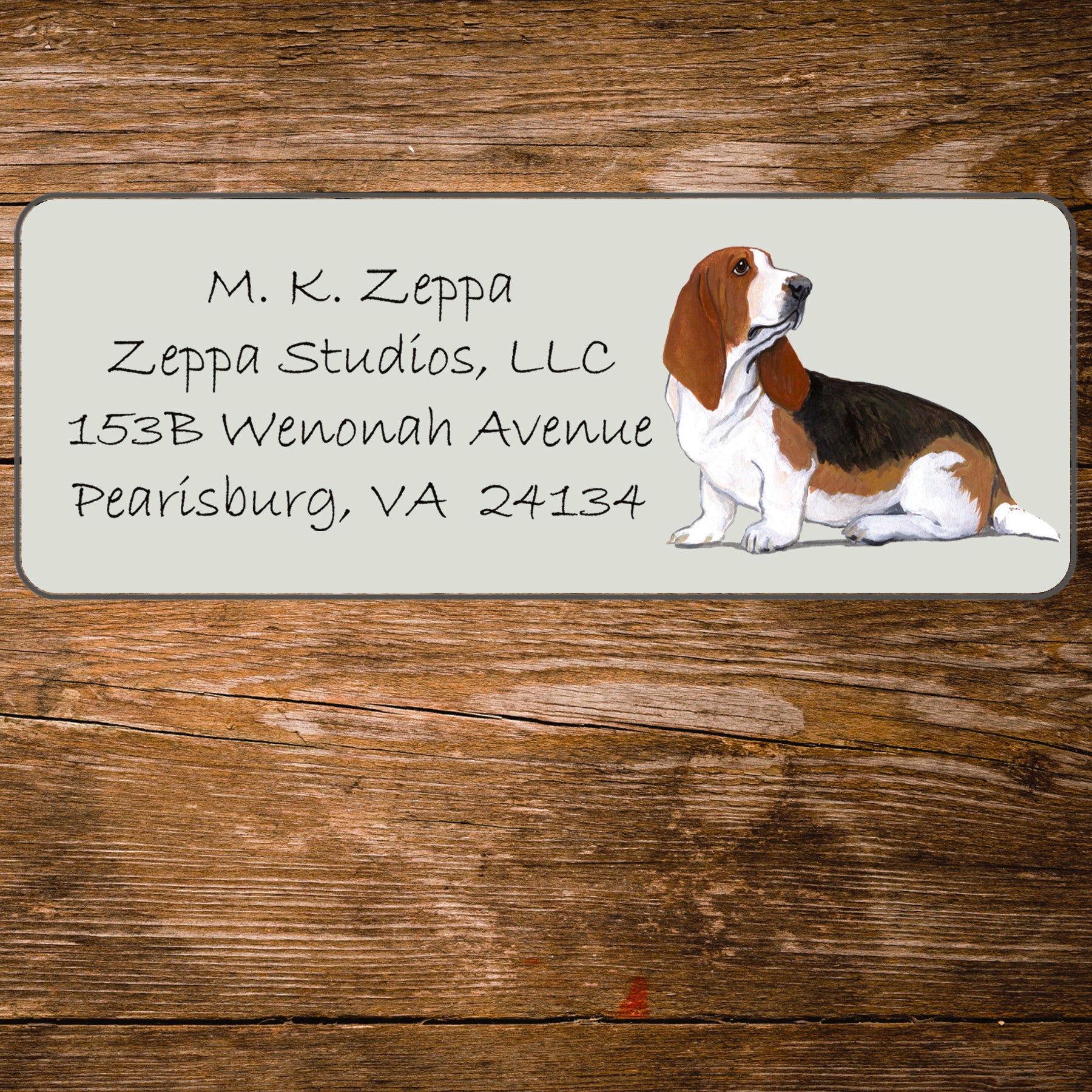 Address label with an Basset Hound illustration on a wooden background