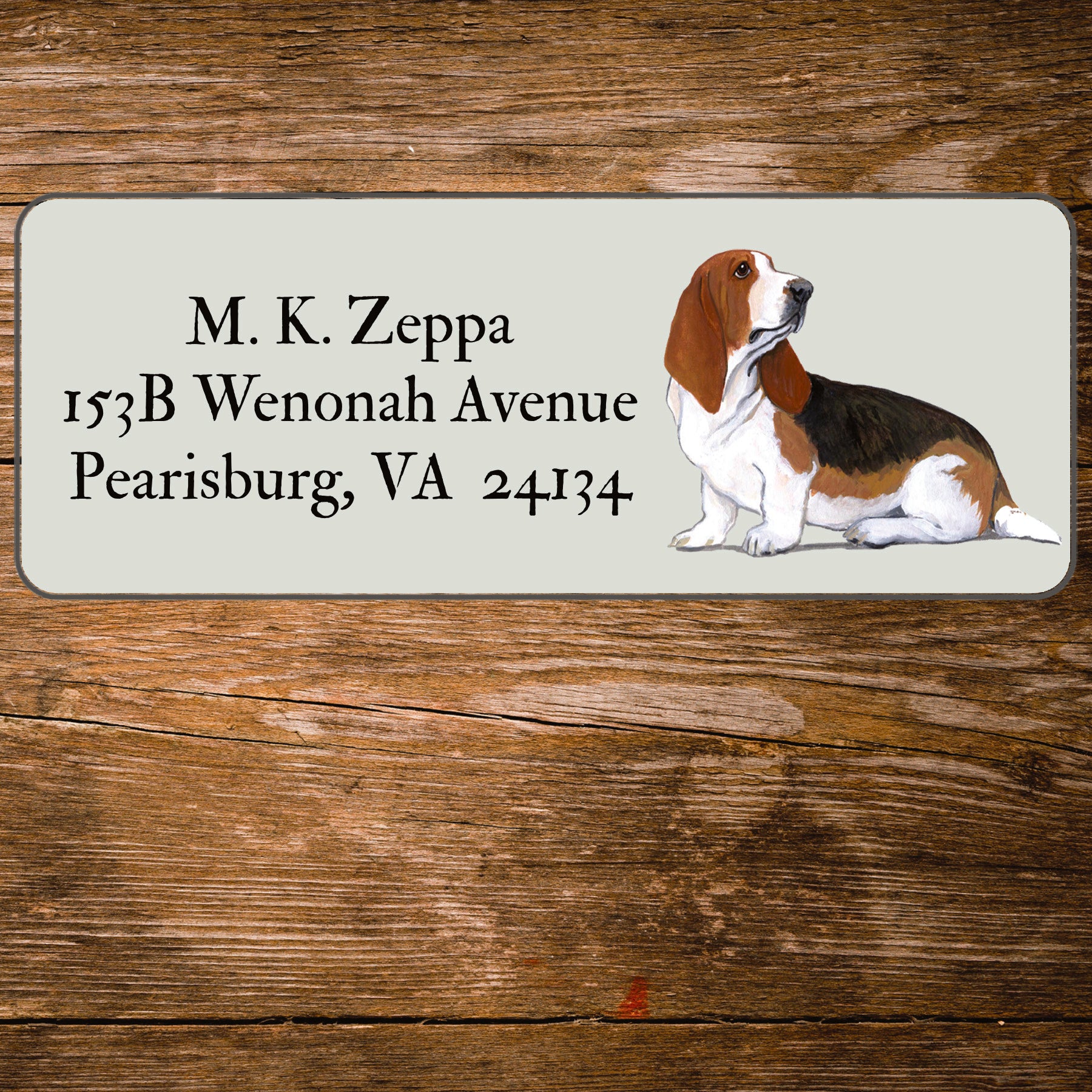Address label with an Basset Hound illustration on a wooden background