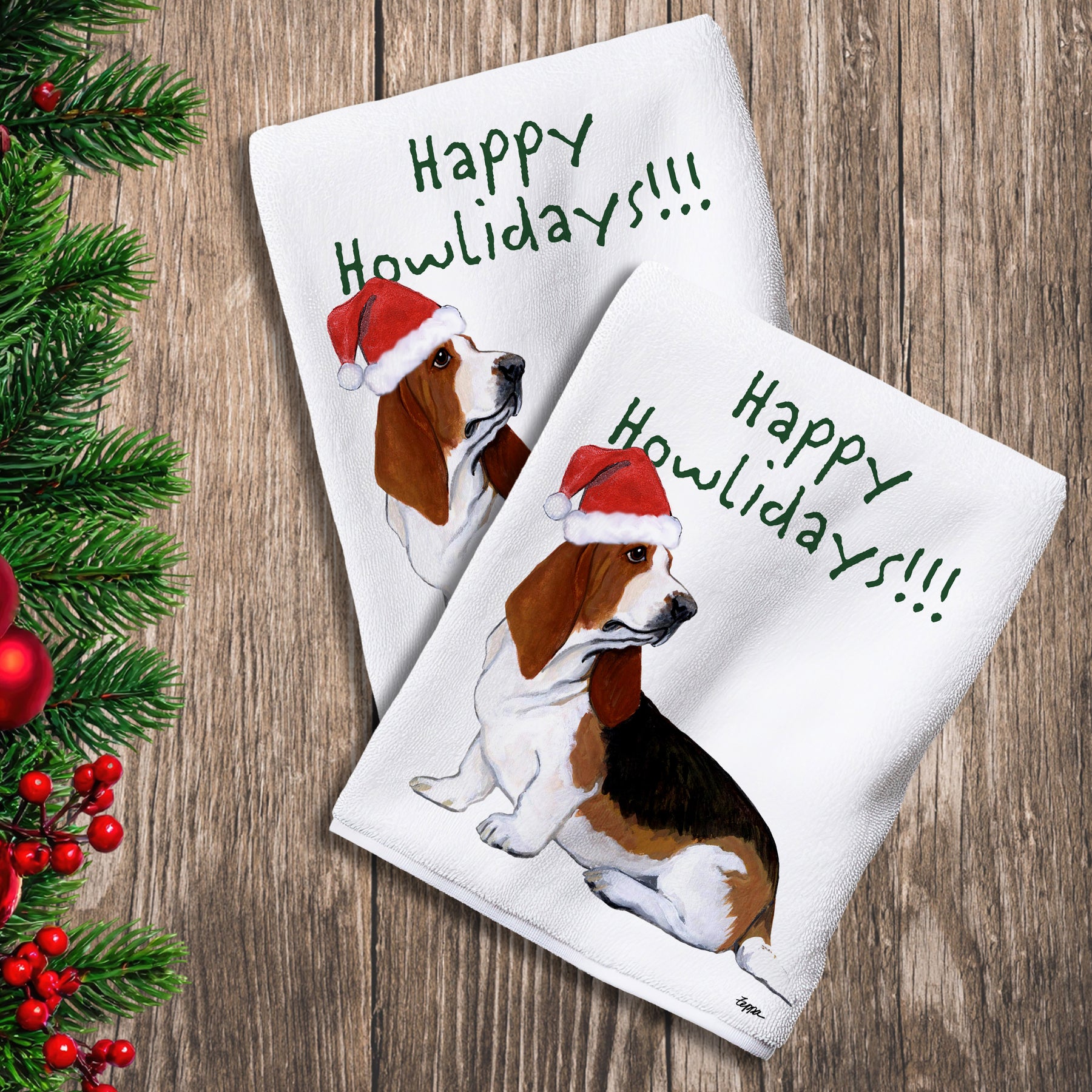 2 Kitchen Towels with a Basset Hound in a Santa Hat and Happy Howlidays text.