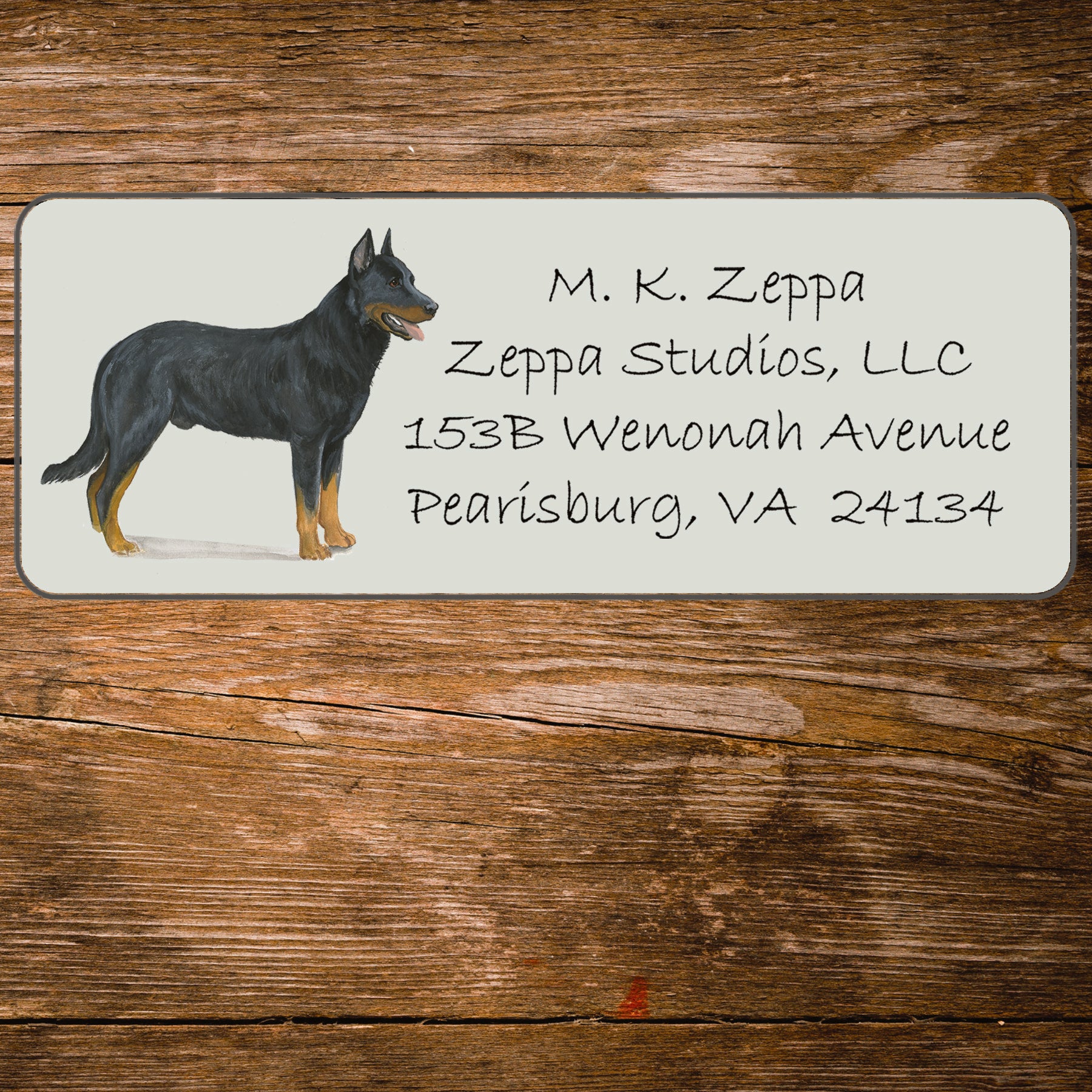 Return address label with a Beauceron illustration
