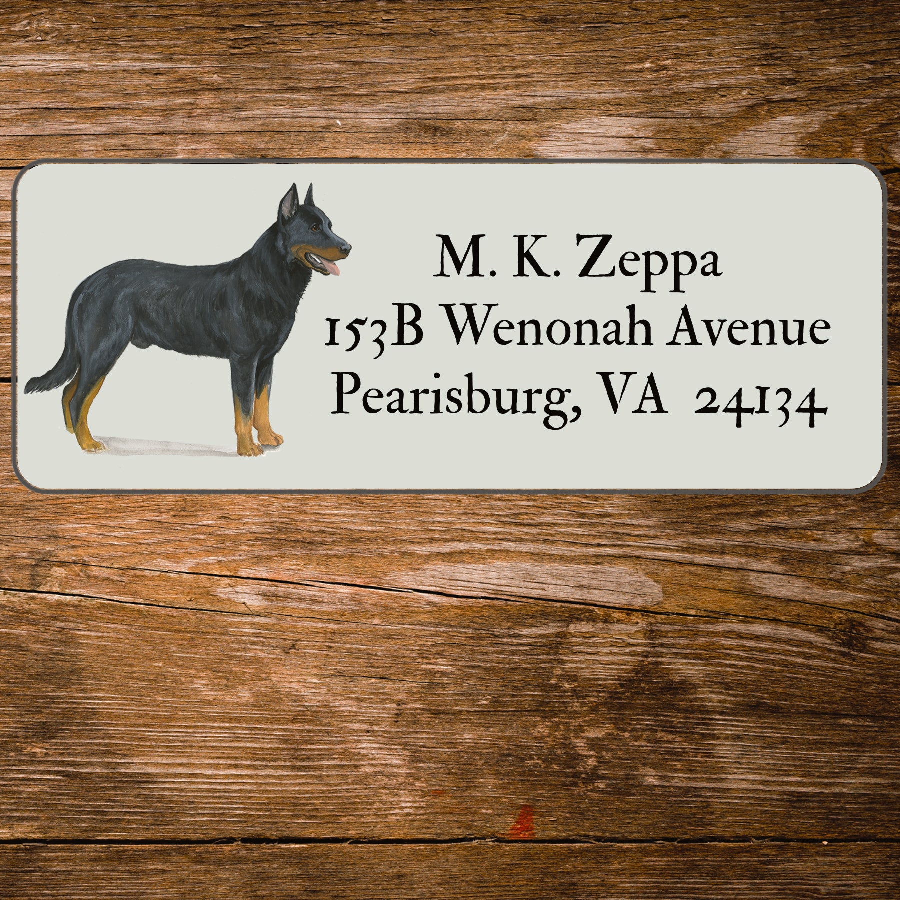 Return address label with a Beauceron illustration