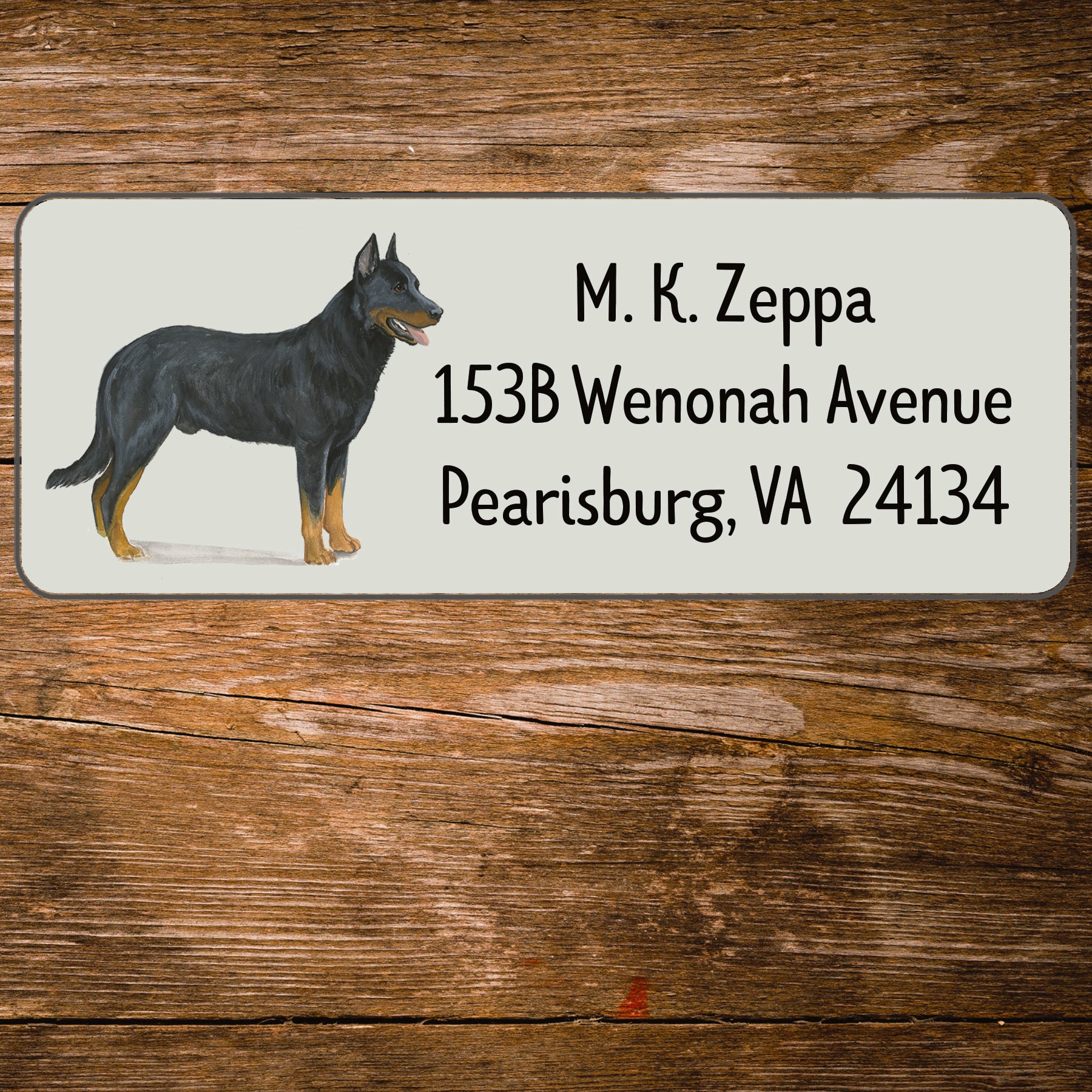 Return address label with a Beauceron illustration