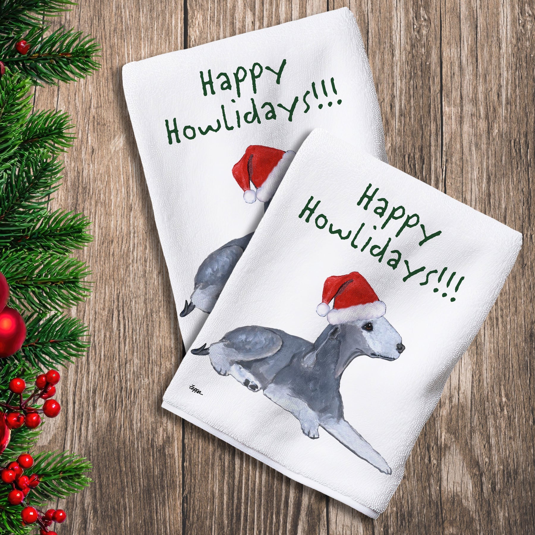 2 Kitchen Towels with a Bedlington Terrier in a Santa Hat and Happy Howlidays text.
