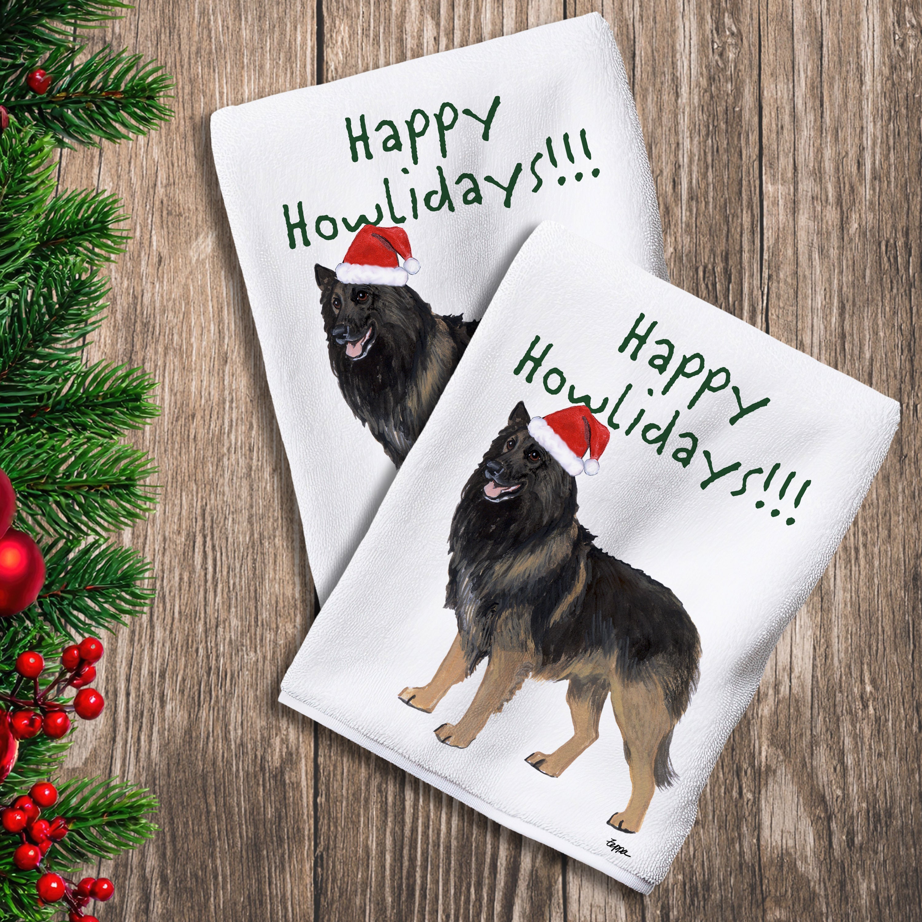 2 Kitchen Towels with a Belgian Tervuren in a Santa Hat and Happy Howlidays text.