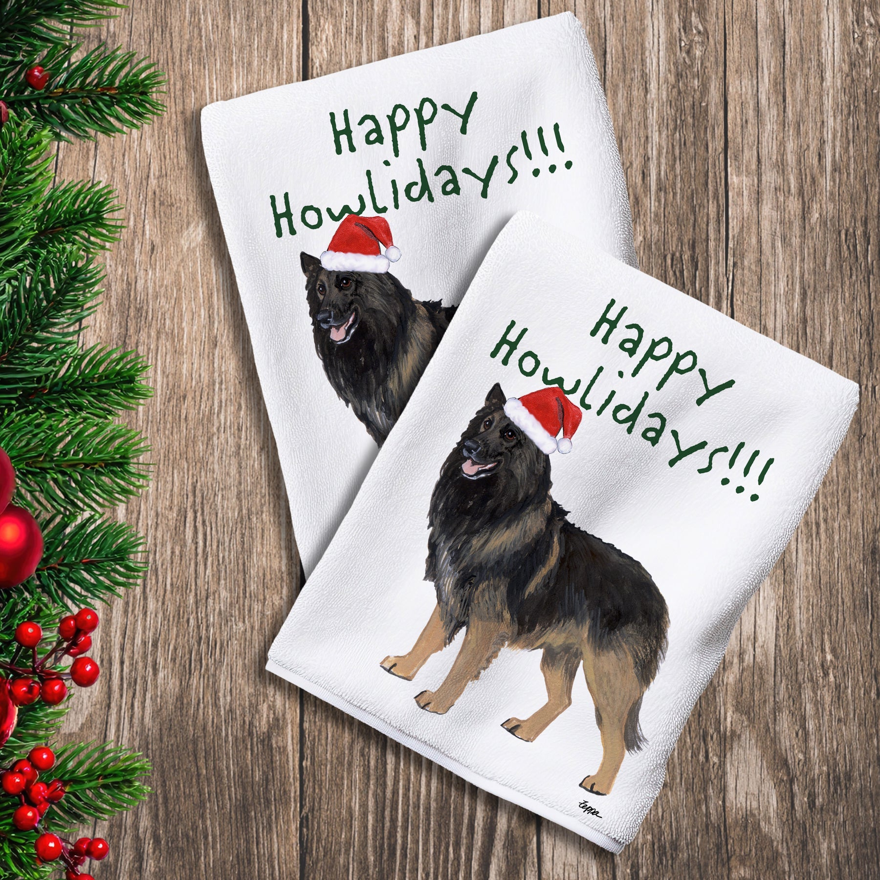 2 Kitchen Towels with a Belgian Tervuren in a Santa Hat and Happy Howlidays text.