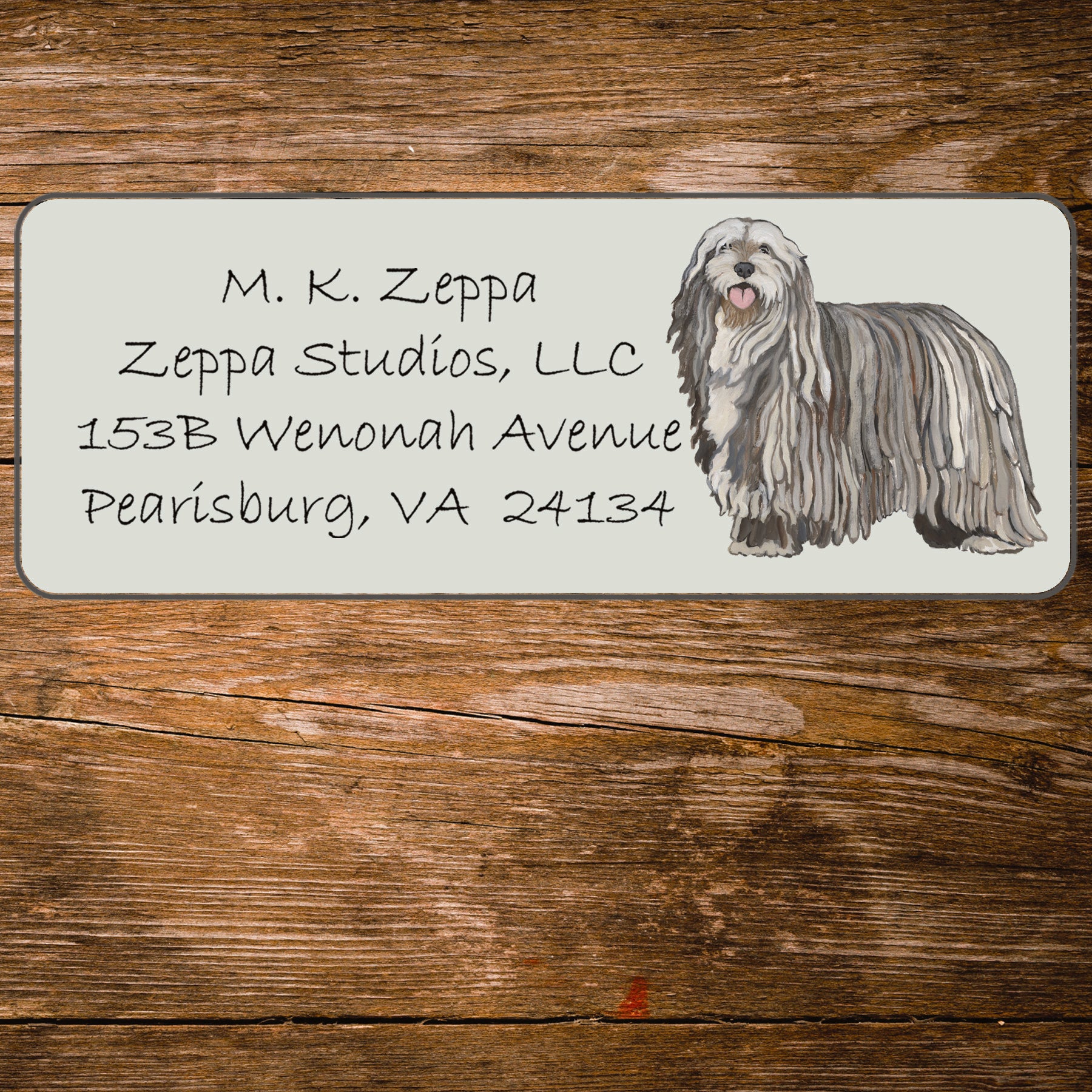 Return address label with an illustration of a Bergamasco