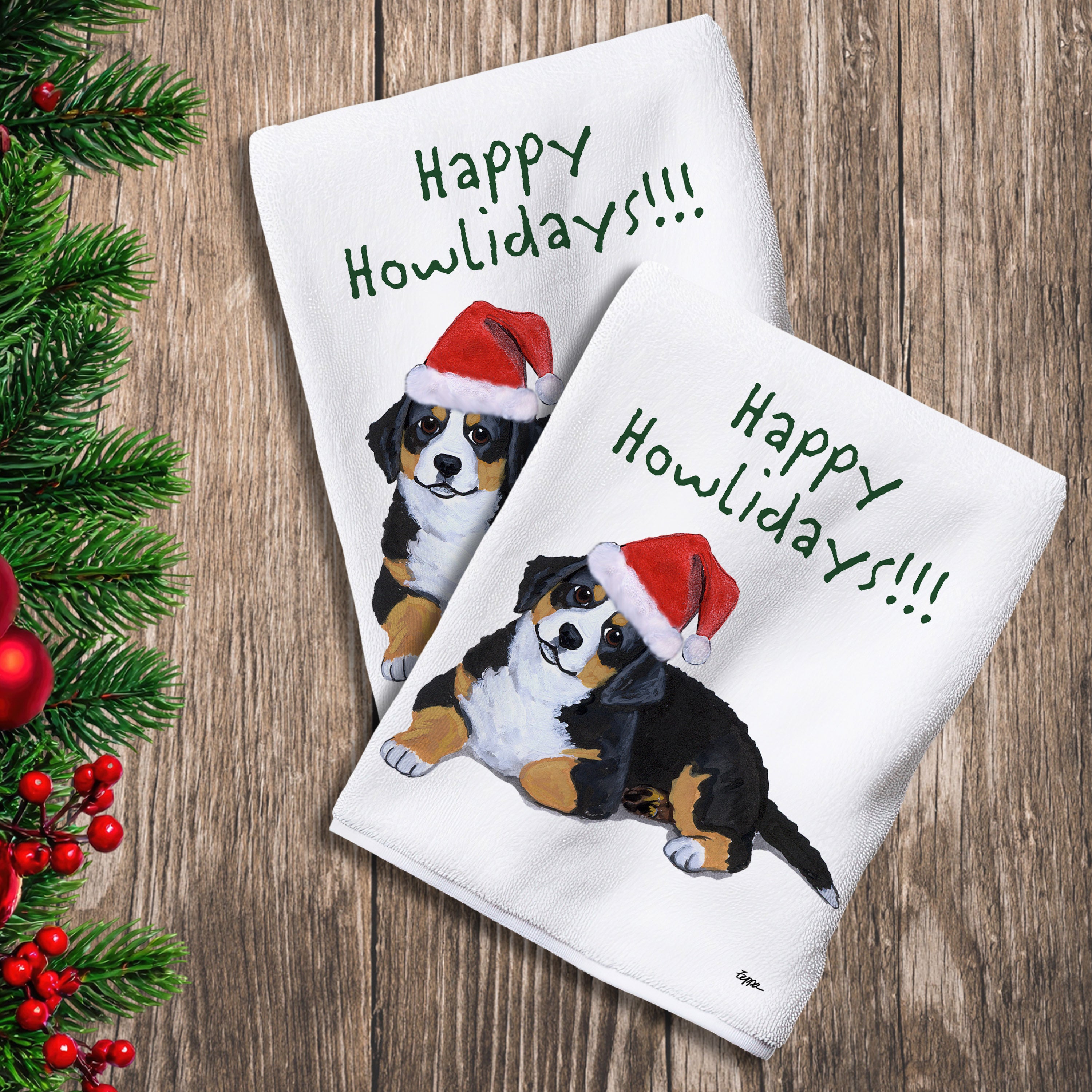 2 Kitchen Towels with a Bernese Mountain Dog puppy in a Santa Hat and Happy Howlidays text.