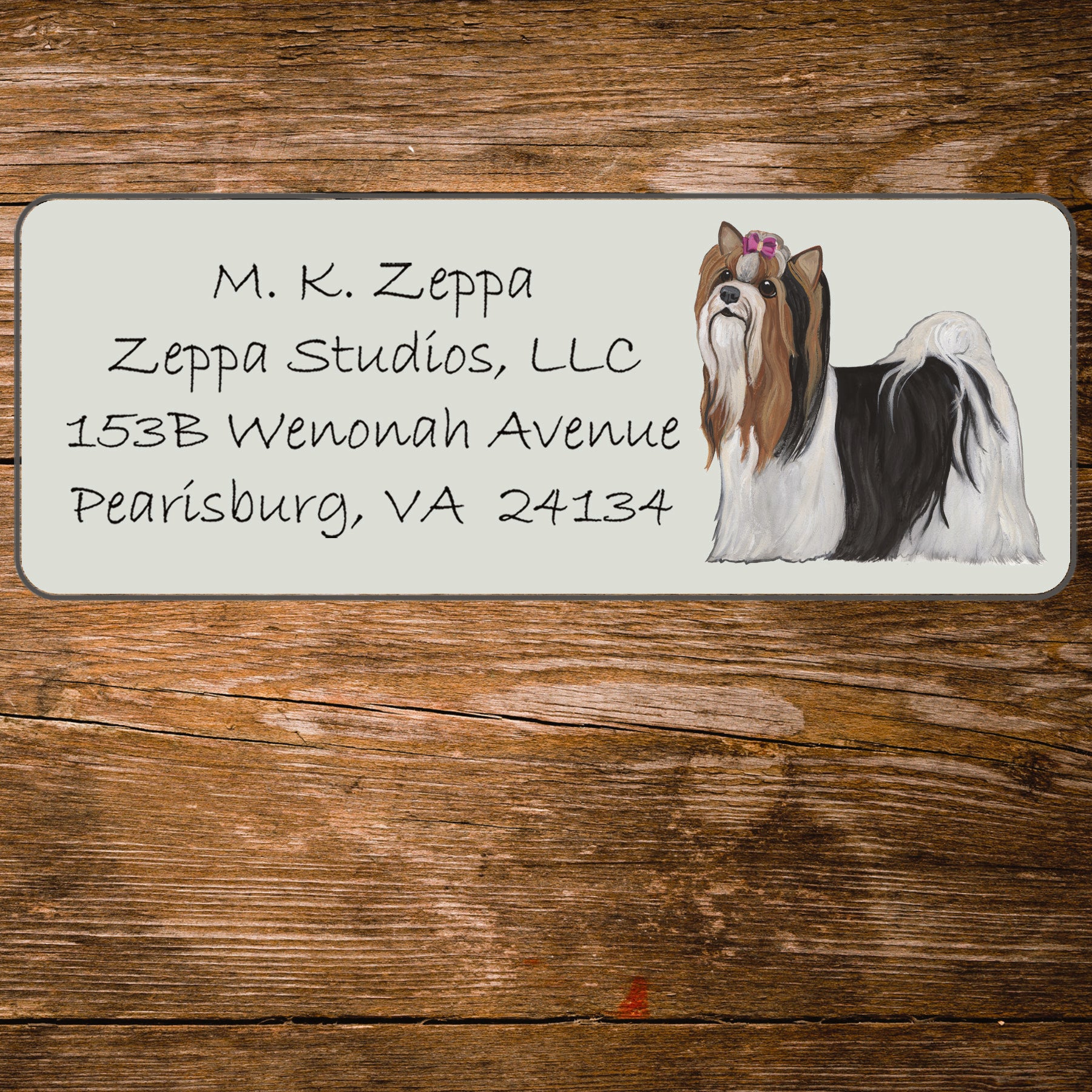 Return address label with an illustration of a Biewer Terrier