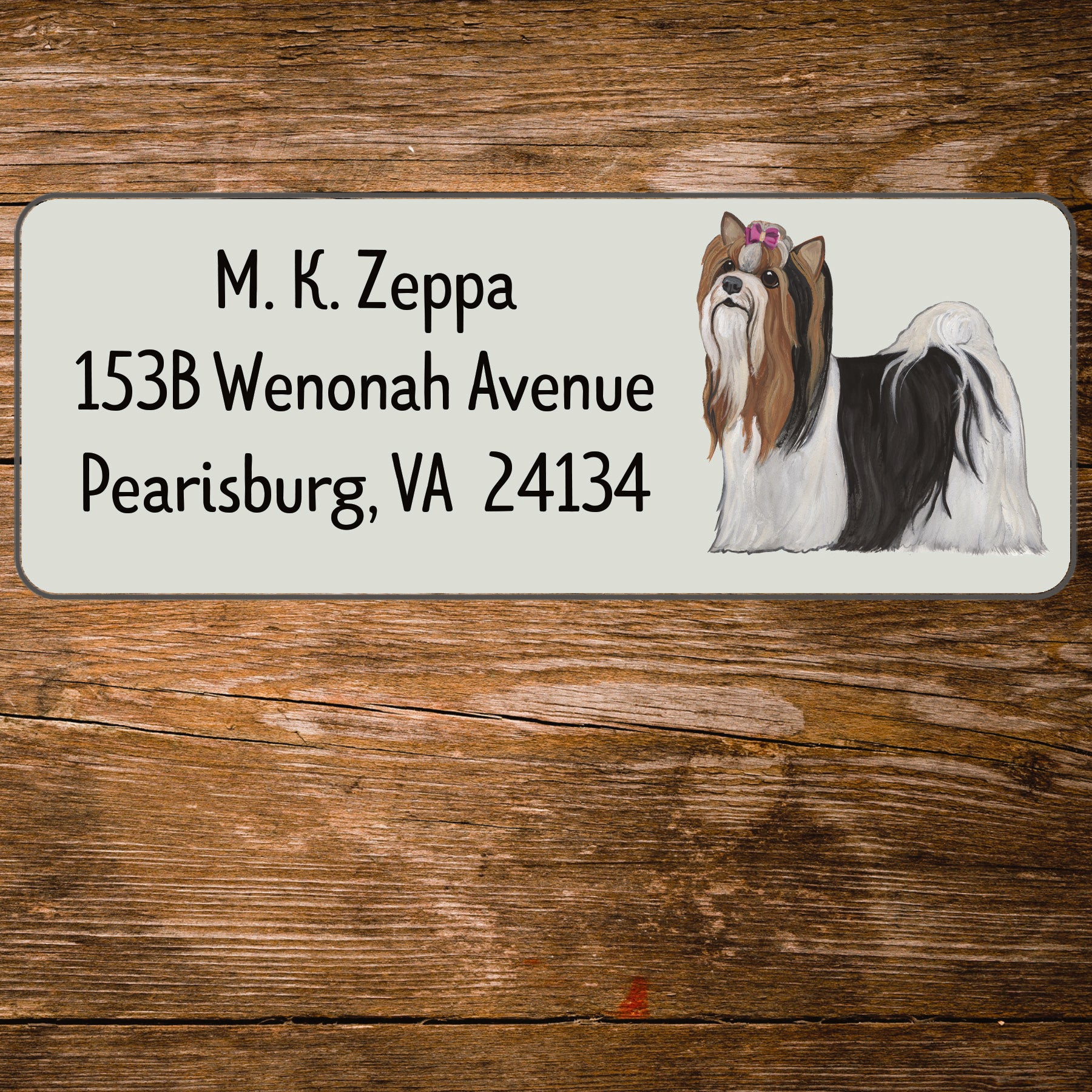 Return address label with an illustration of a Biewer Terrier