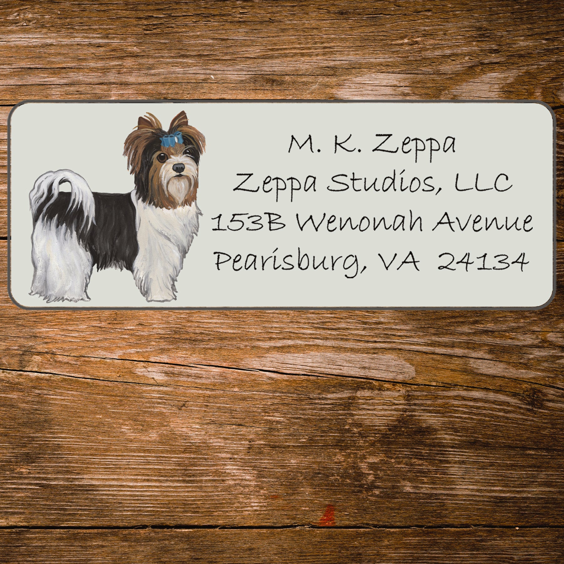 Return address label with an illustration of a Biewer Terrier