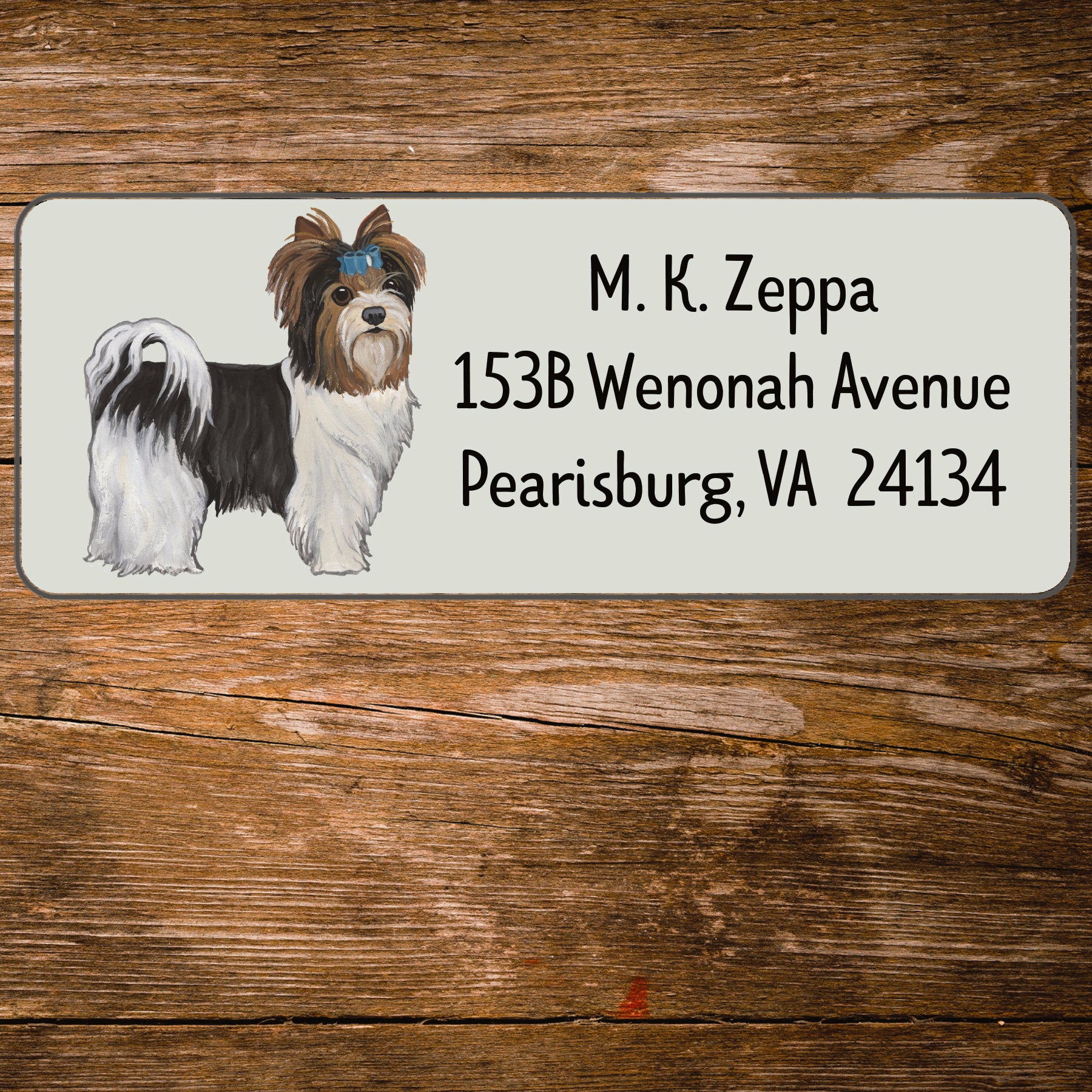 Return address label with an illustration of a Biewer Terrier