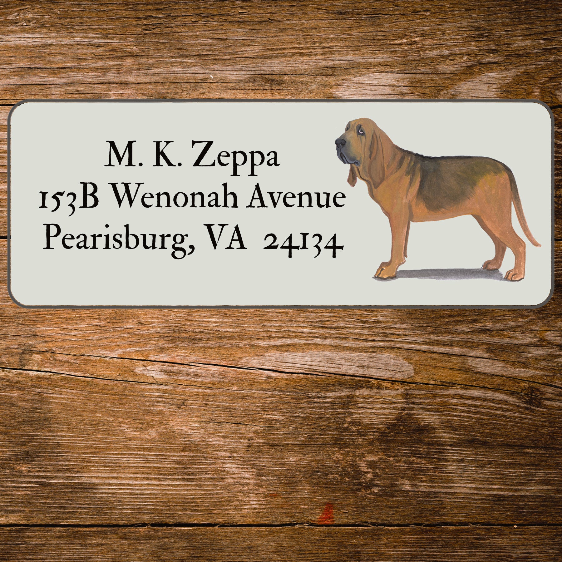 Return address label with a Bloodhound illustration
