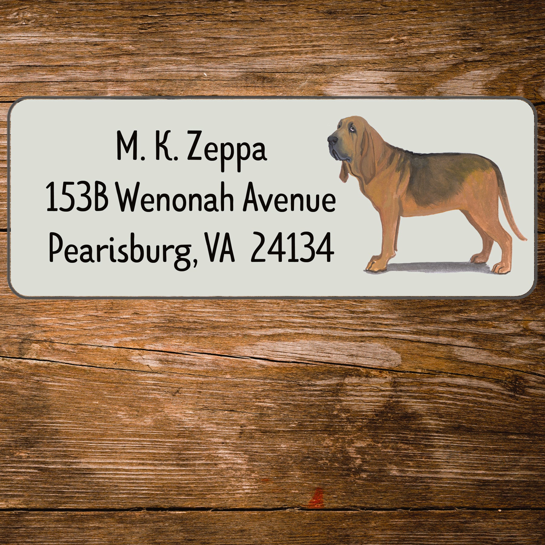 Return address label with a Bloodhound illustration