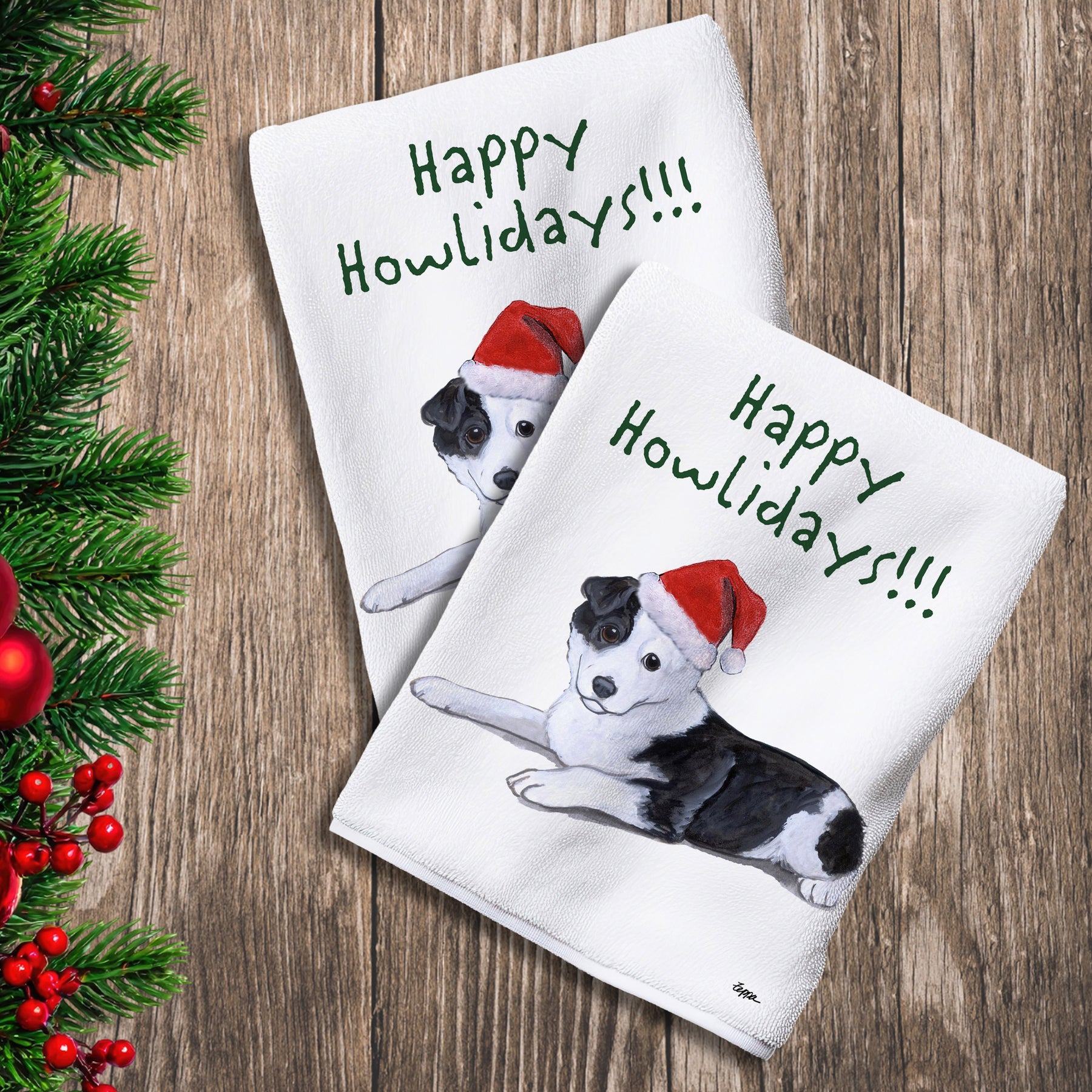 2 Kitchen Towels with a Border Collie puppy in a Santa Hat and Happy Howlidays text.