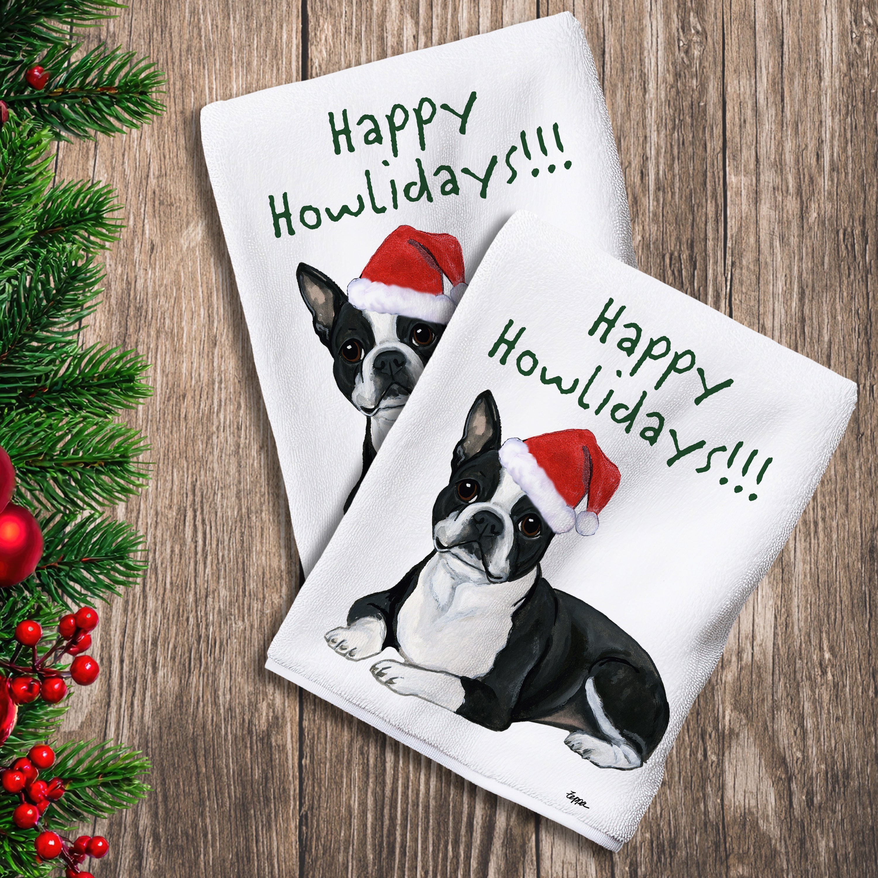 2 Kitchen Towels with a Boston Terrier lying down in a Santa Hat and Happy Howlidays text.