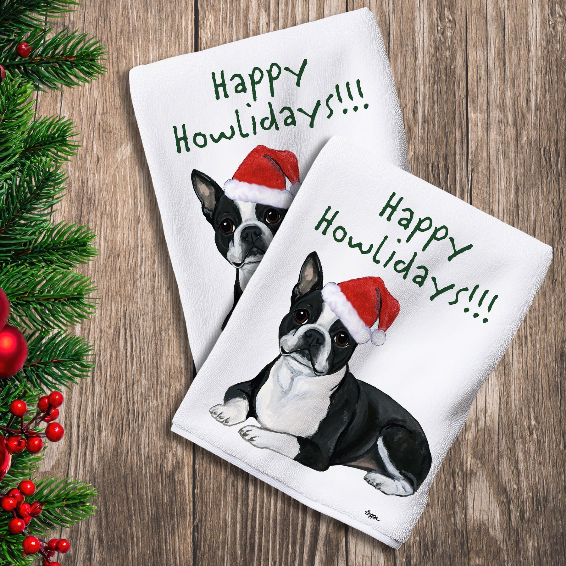 2 Kitchen Towels with a Boston Terrier lying down in a Santa Hat and Happy Howlidays text.
