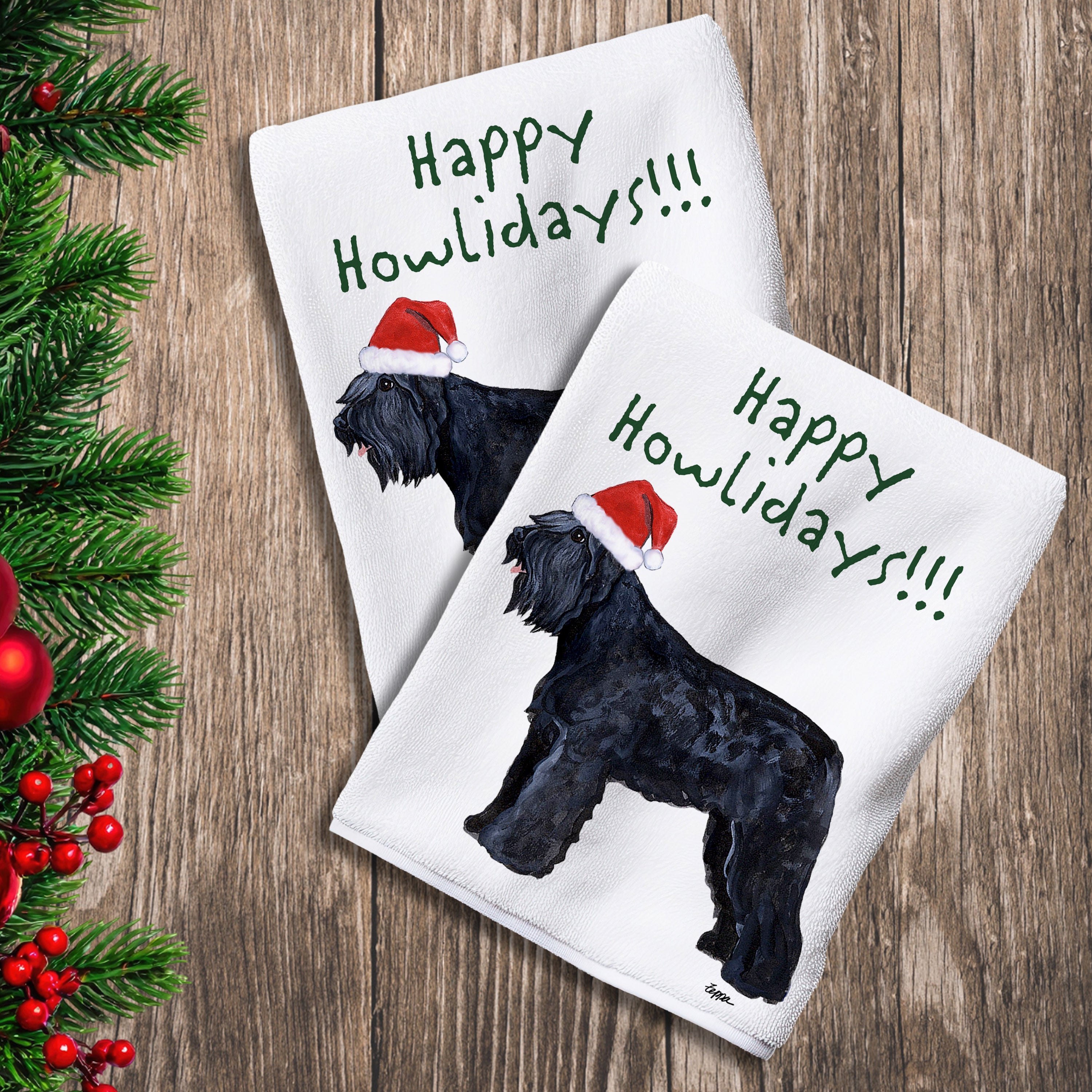 2 Kitchen Towels with a Bouvier in a Santa Hat and Happy Howlidays text.