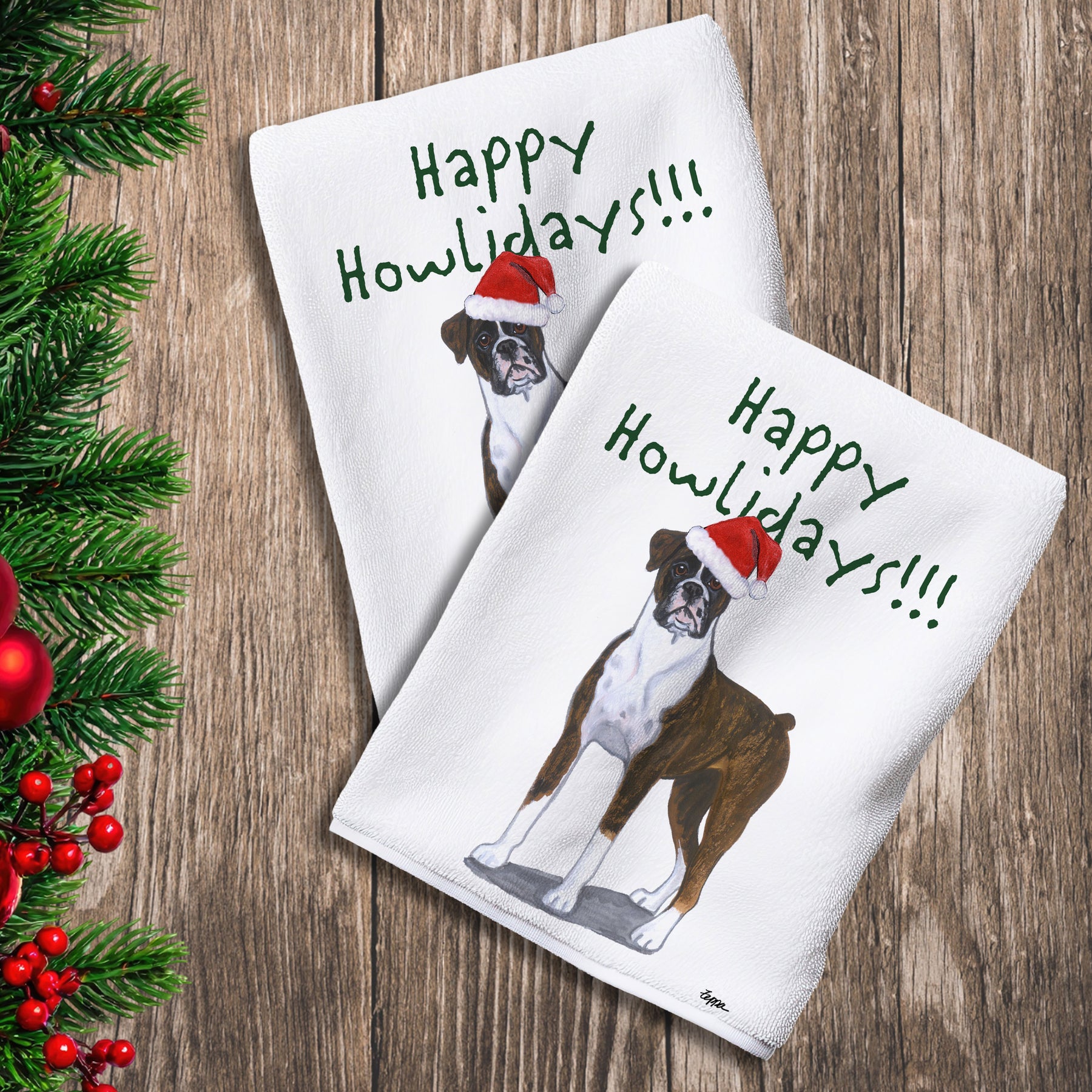2 Kitchen Towels with an uncropped brindle Boxer in a Santa Hat and Happy Howlidays text.