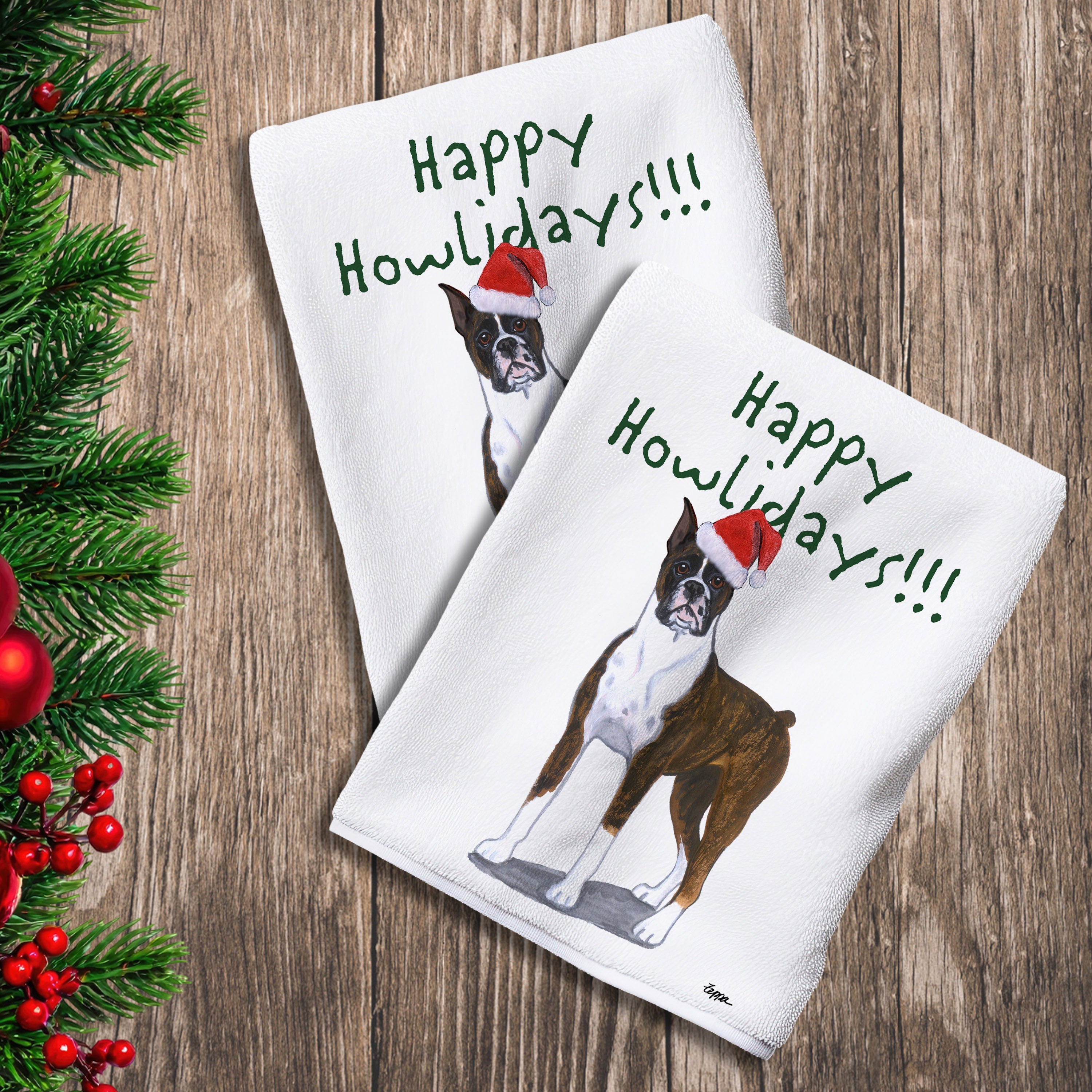 2 Kitchen Towels with a brindle Boxer in a Santa Hat and Happy Howlidays text.