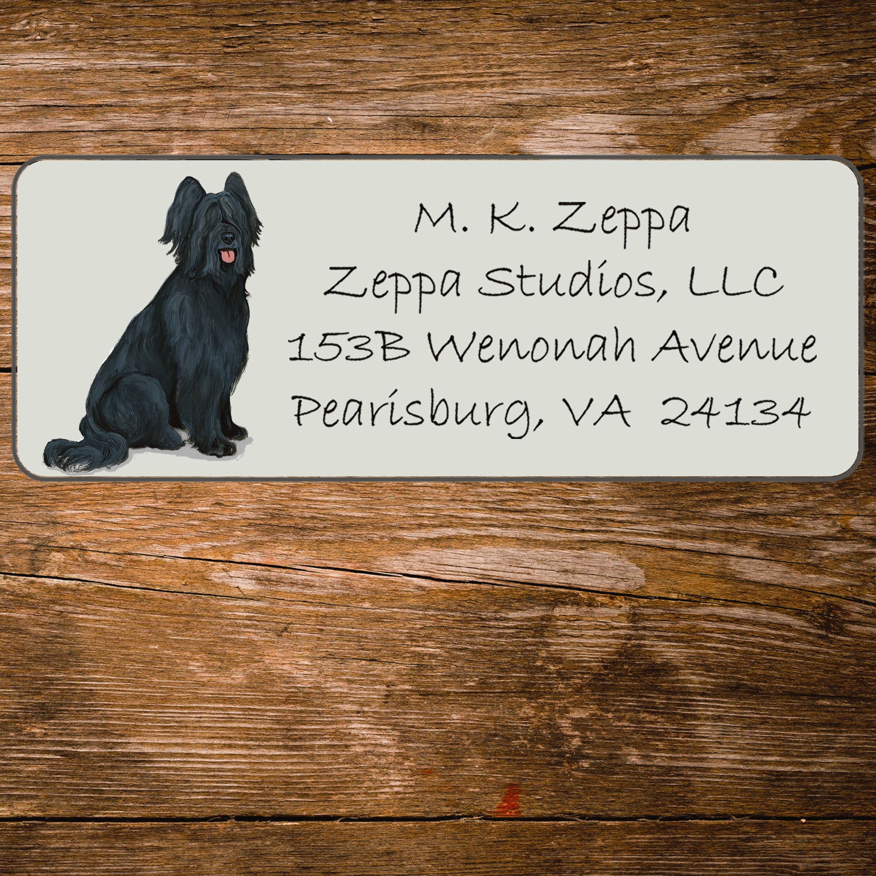 Return address label with a Briard illustration.