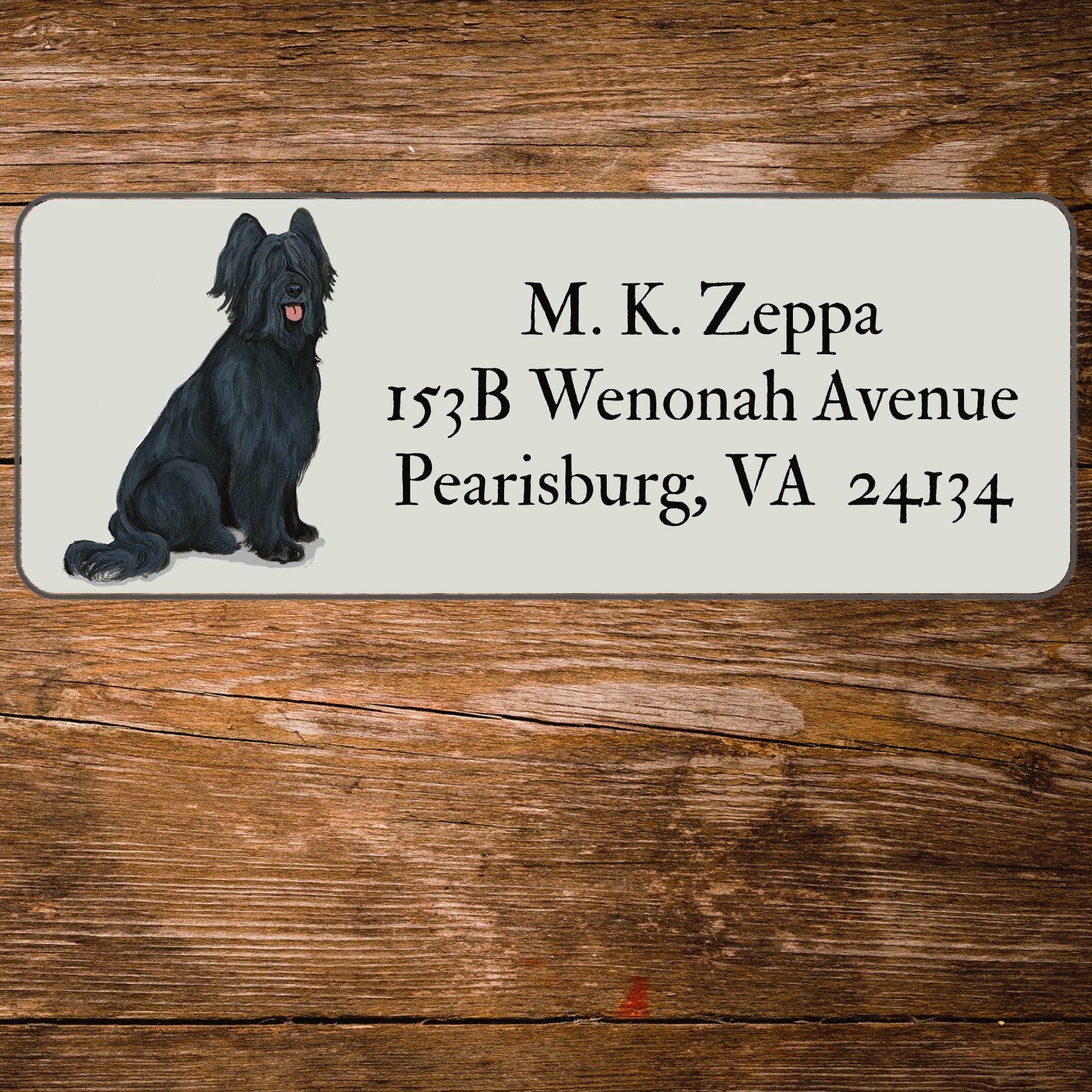 Return address label with a Briard illustration.