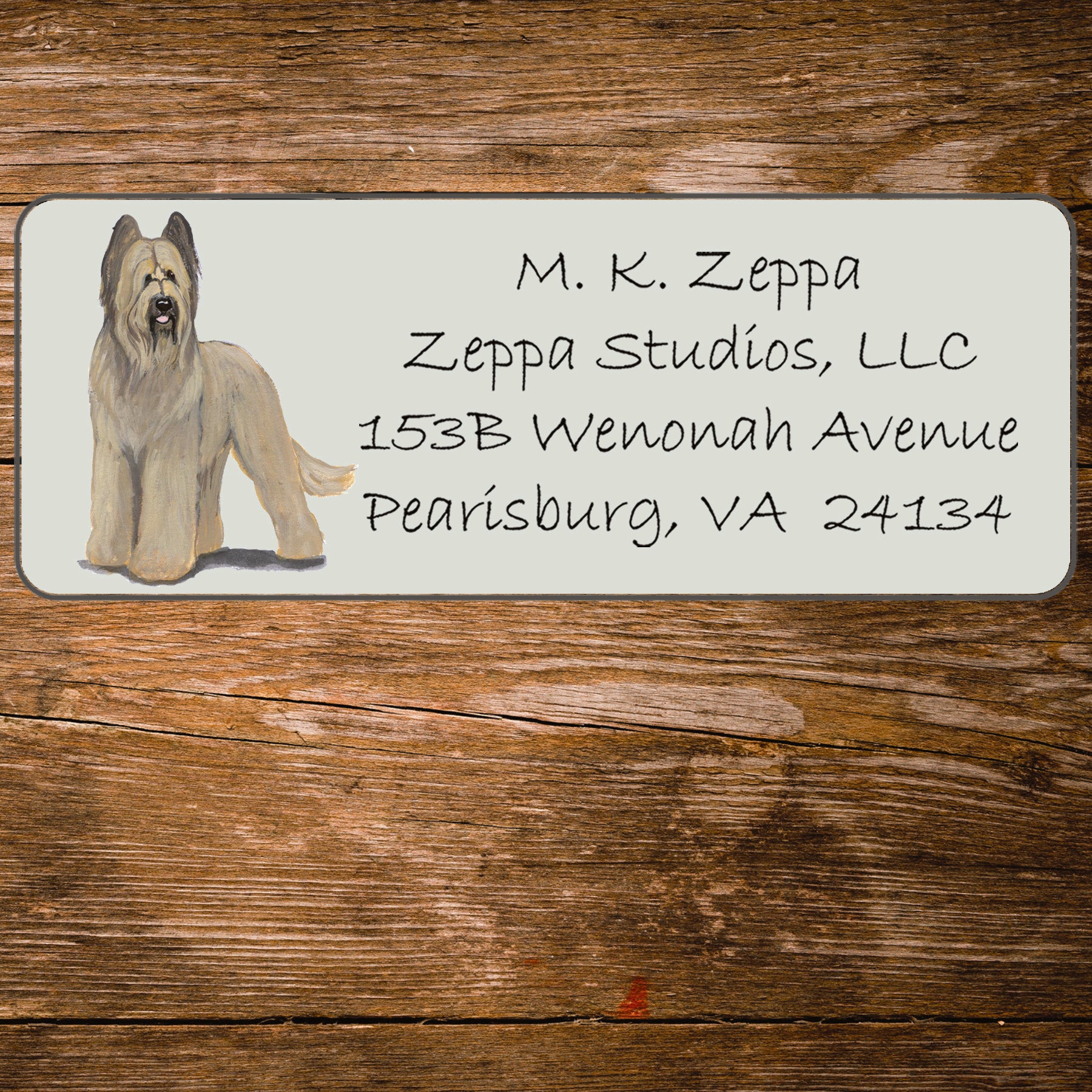 Return address label with a Briard illustration.