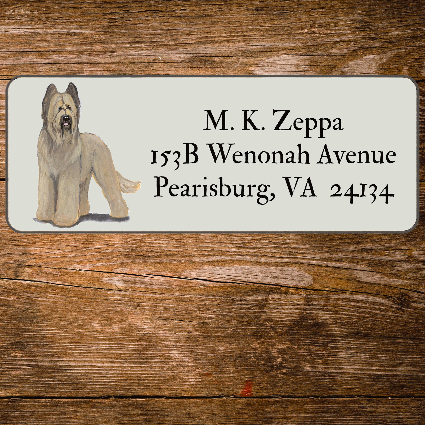 Return address label with a Briard illustration.