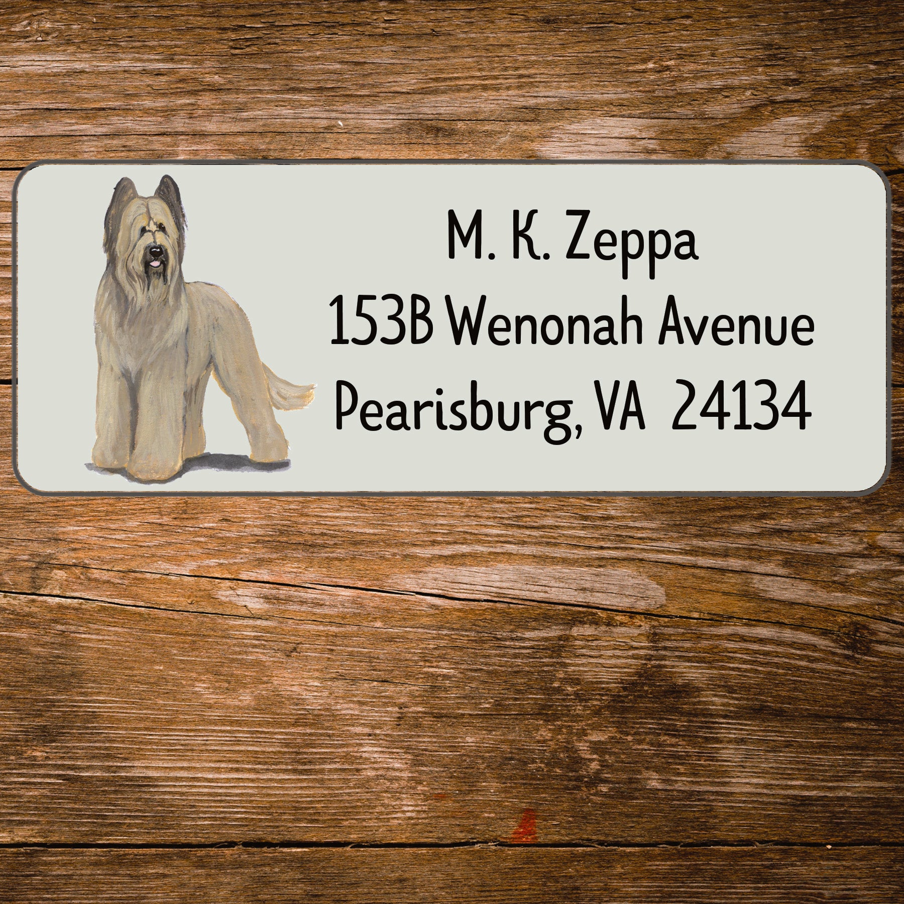 Return address label with a Briard illustration.