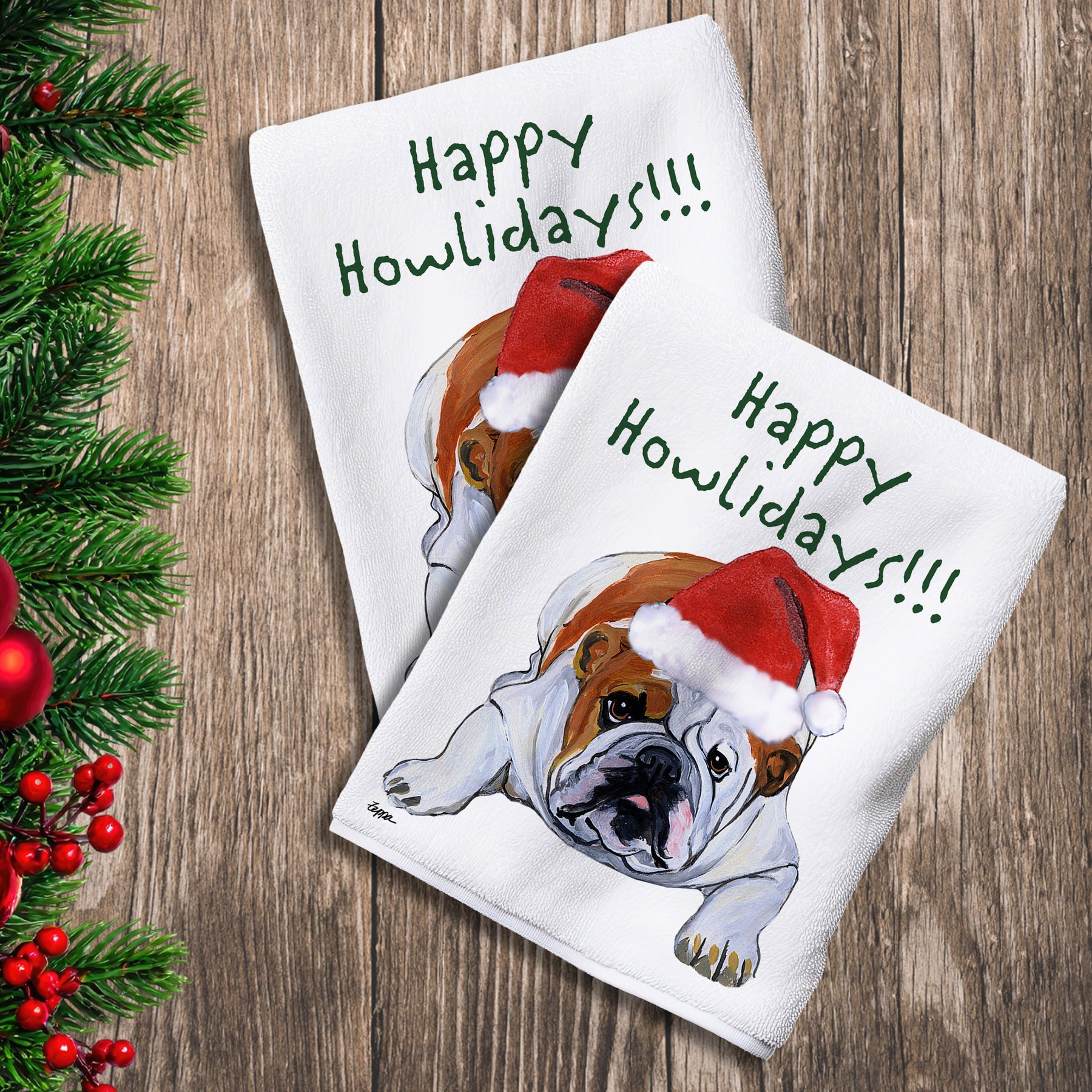 2 Kitchen Towels with a Bulldog in a Santa Hat and Happy Howlidays text.